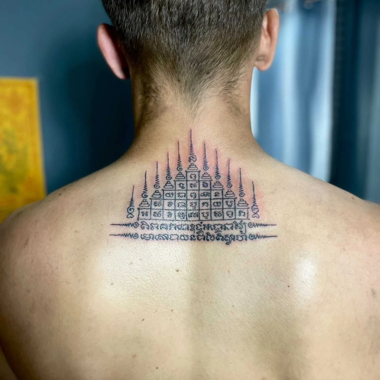 A man with a Gao Yord bamboo tattoo