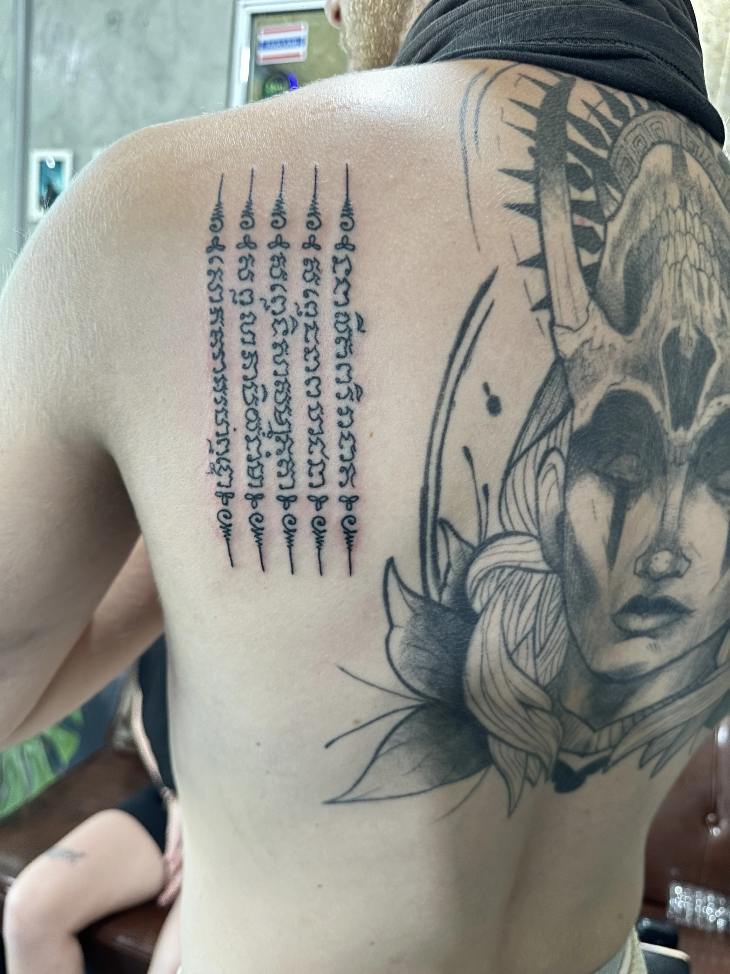 Hah Taew sak yant on a man in Phuket