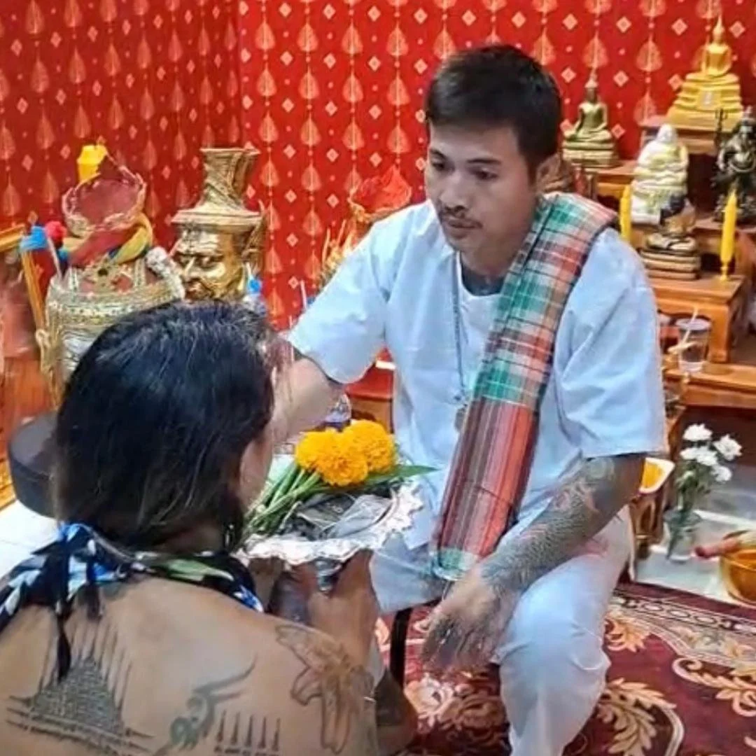 Ajarn Chai providing a spiritual blessing after Sak Yant in Karon Phuket temple room