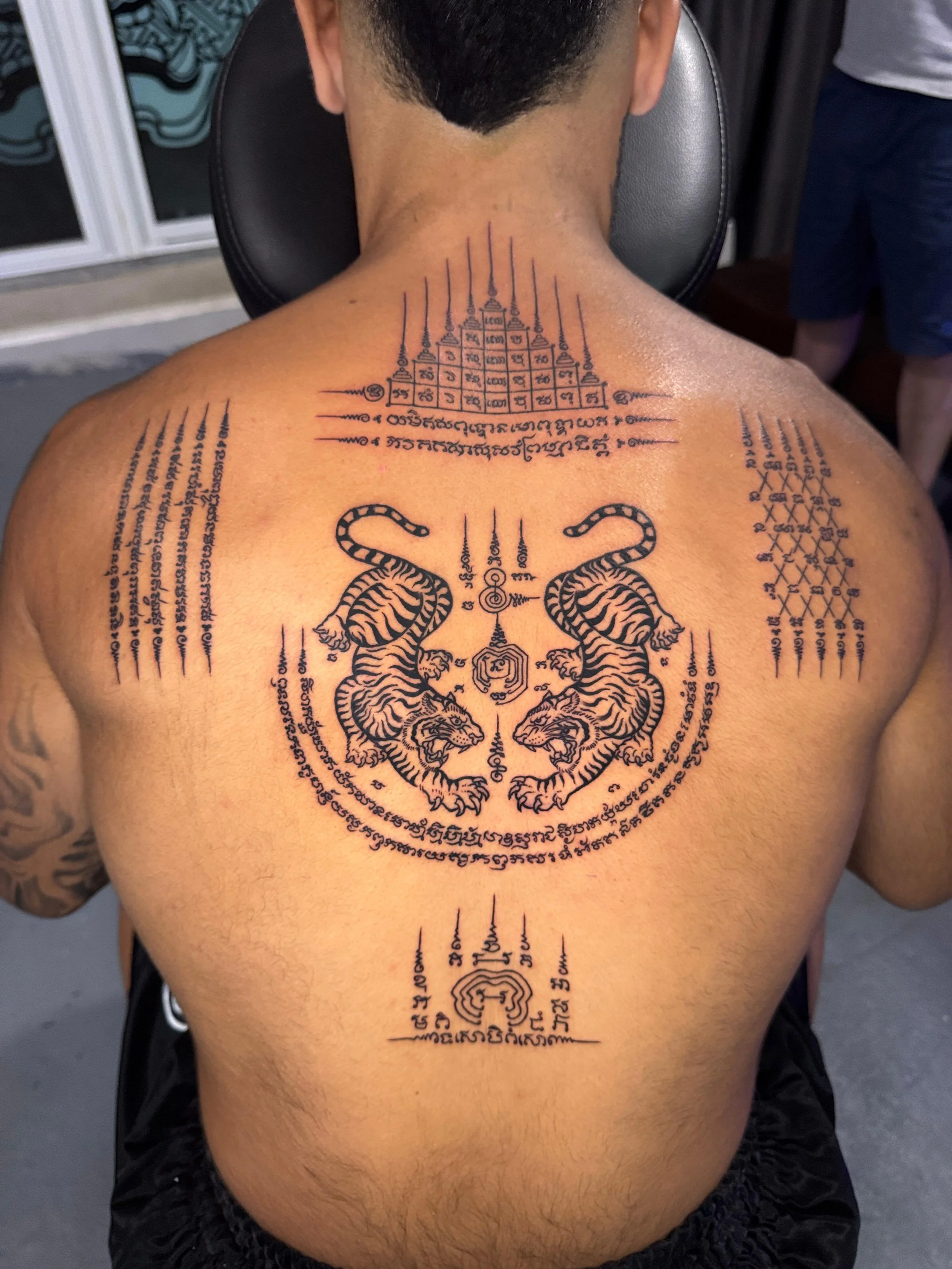 A full back of sak yant done in karon, phuket
