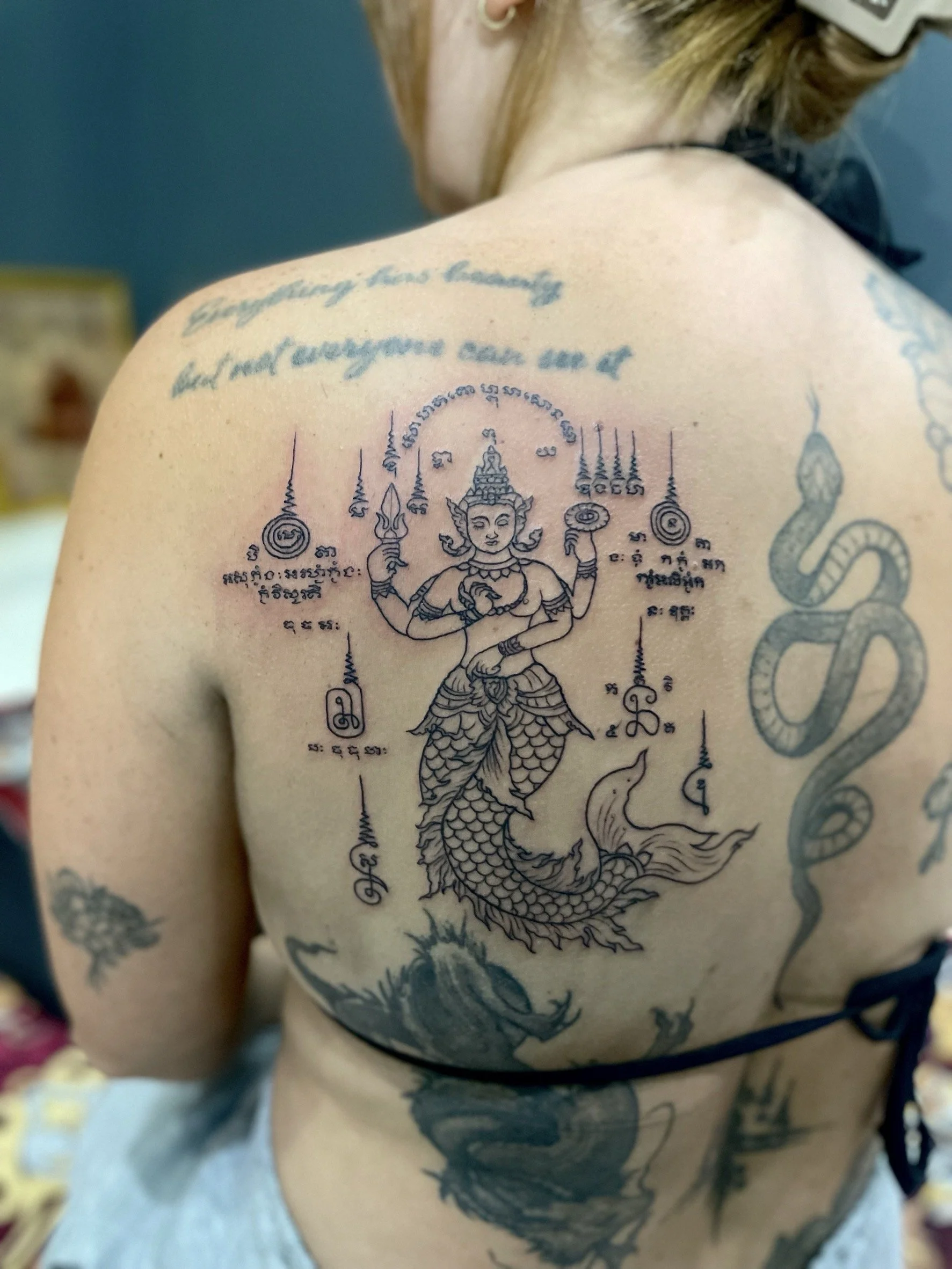 Mermaid Sak Yant Nang Nguek traditional thai tattool