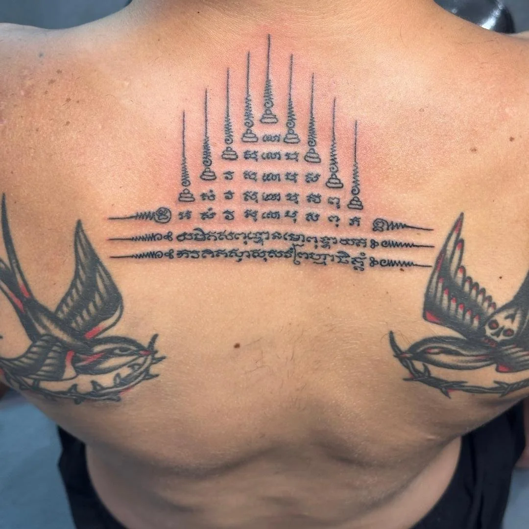 a bamboo Gao yord sak yant upper neck in phuket