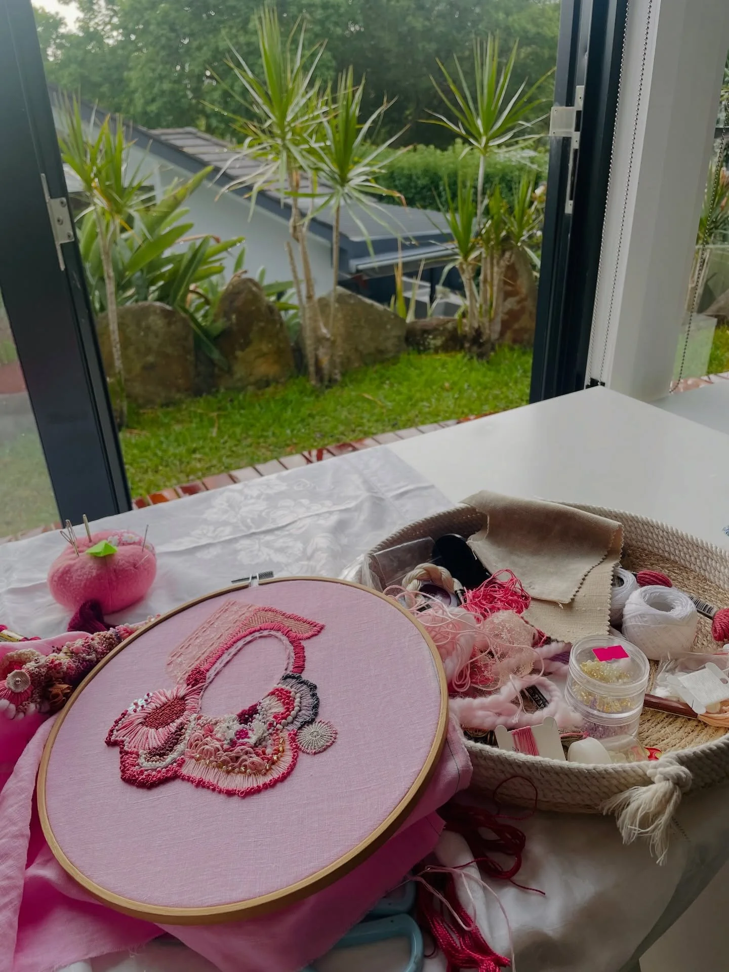 When I spring cleaned my studio earlier this week I reconfigured the furniture. I love my work desk facing out onto the garden. Today was rainy and I loved having the bifold door open listening to and watching the rain, as I stitched. 

#elizabethsul