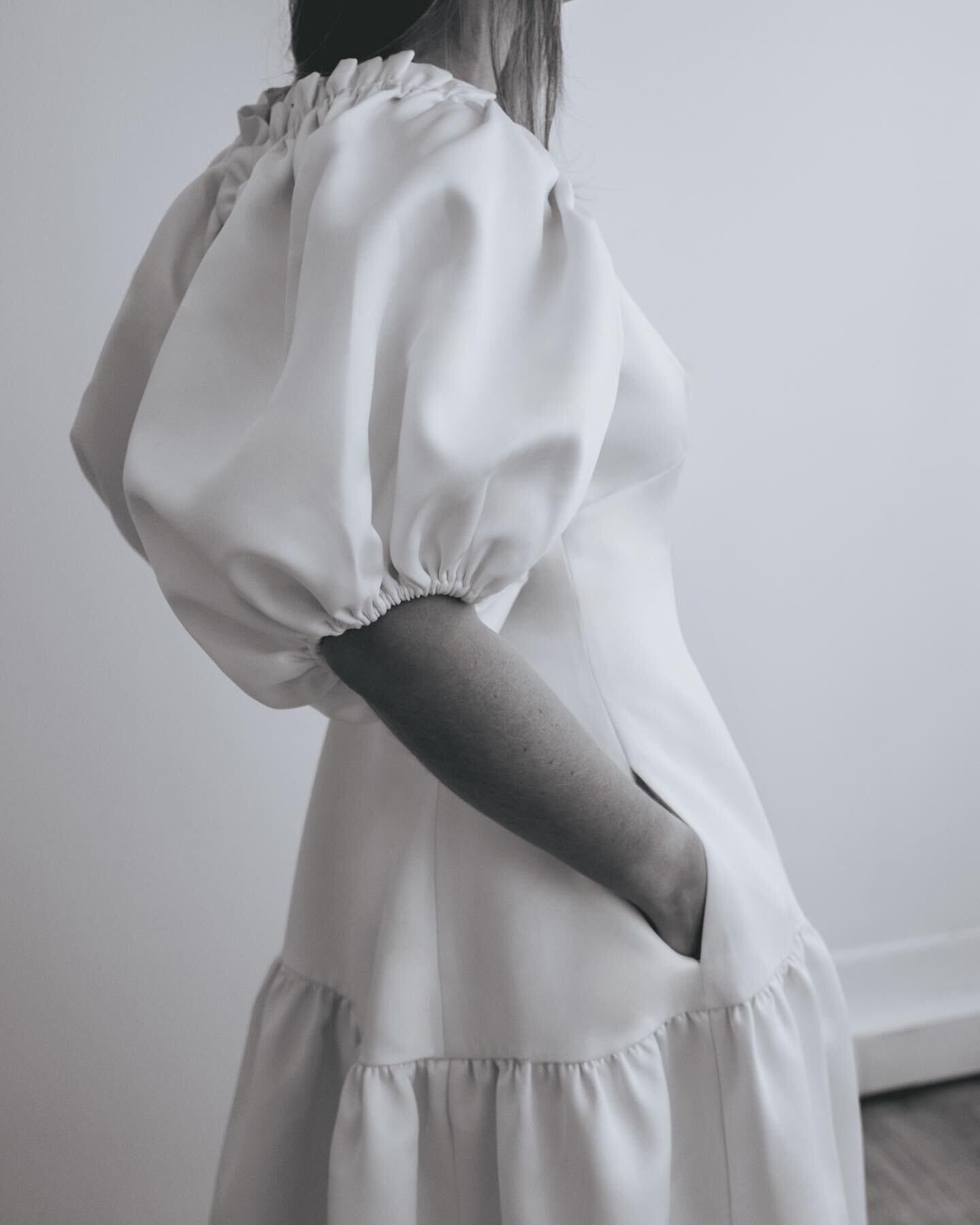 The MILA double satin gown with MARTA sleeves. The perfect pairing for a clean and minimalist statement silhouette