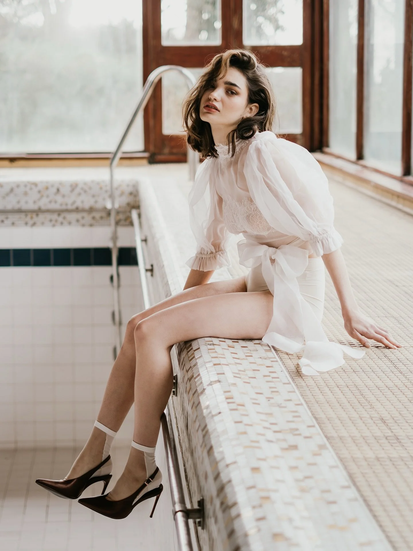 COLLECTION IV

Bold, confident and fashion-forward bridal. Modern yet playfully nostalgic. Detail driven and styling focused.

Meet the transformative silk organza TARA top. Wear her however you choose. 

#bridalseparates #modernbride #weddingdressin