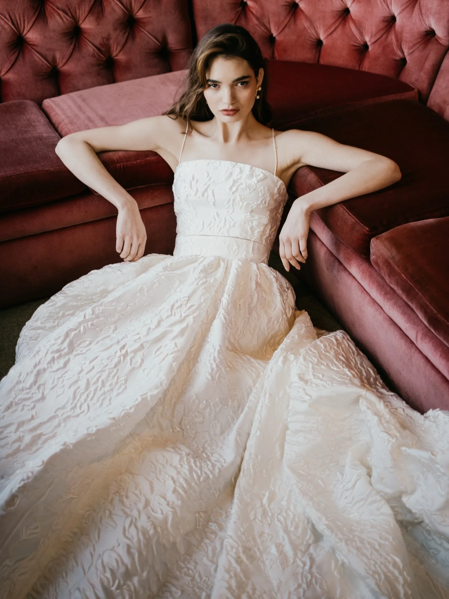 Statement bridal separates with all of the impact of a gown. A sculpting bodice and luxurious full skirt crafted in our textural satin jacquard. With delicate silk shoestring straps, this look gives a nod to effortless 90s minimalism. 

(The bodice i