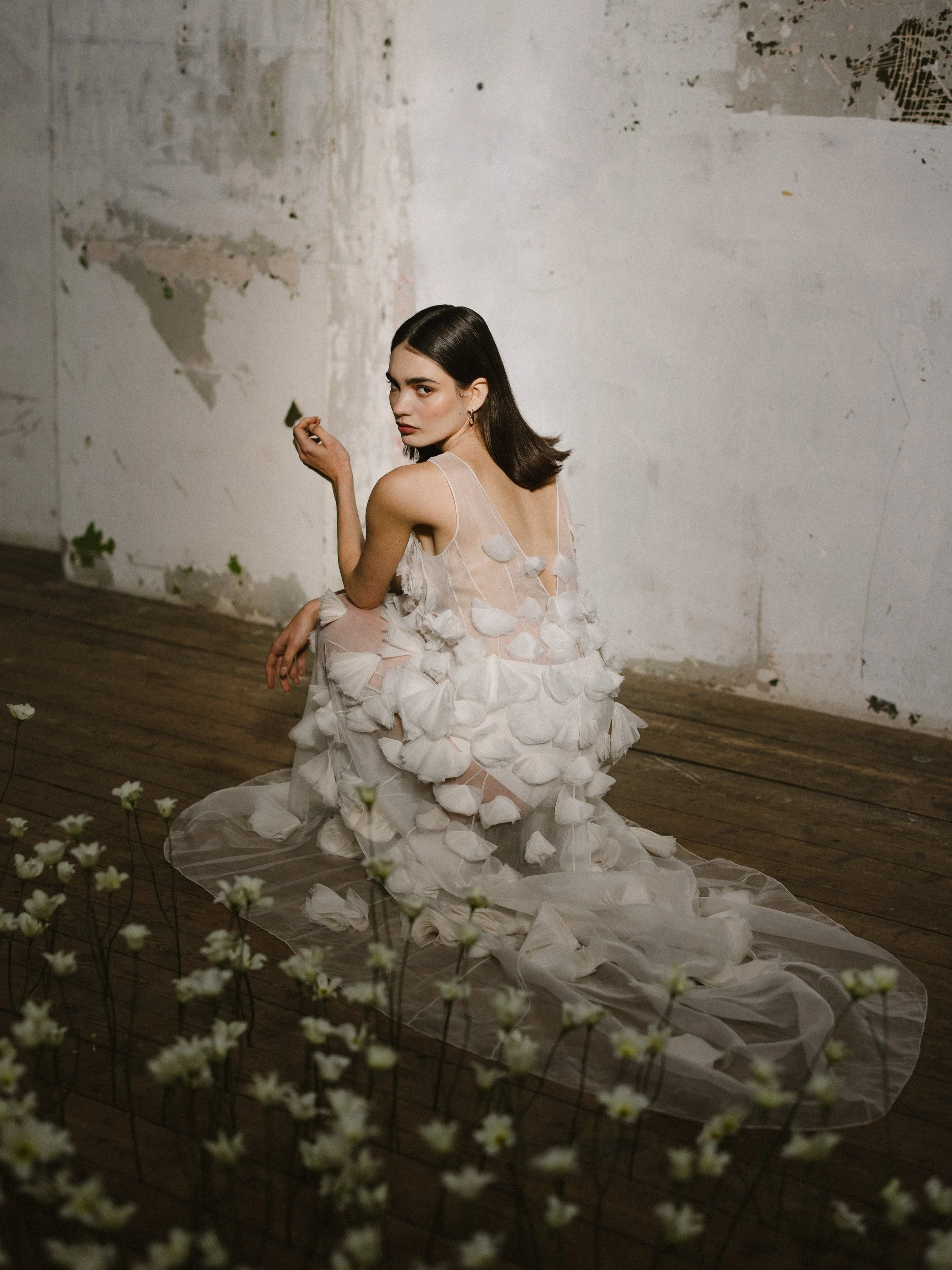 The SWEETPEA gown&hellip;Ethereal sheerness is contrasted with 3D texture. Delicate blooms are translated into textural silk organza flowers. Each flower is hand placed for the perfect amount of coverage and movement. This is a bridal gown for the mo