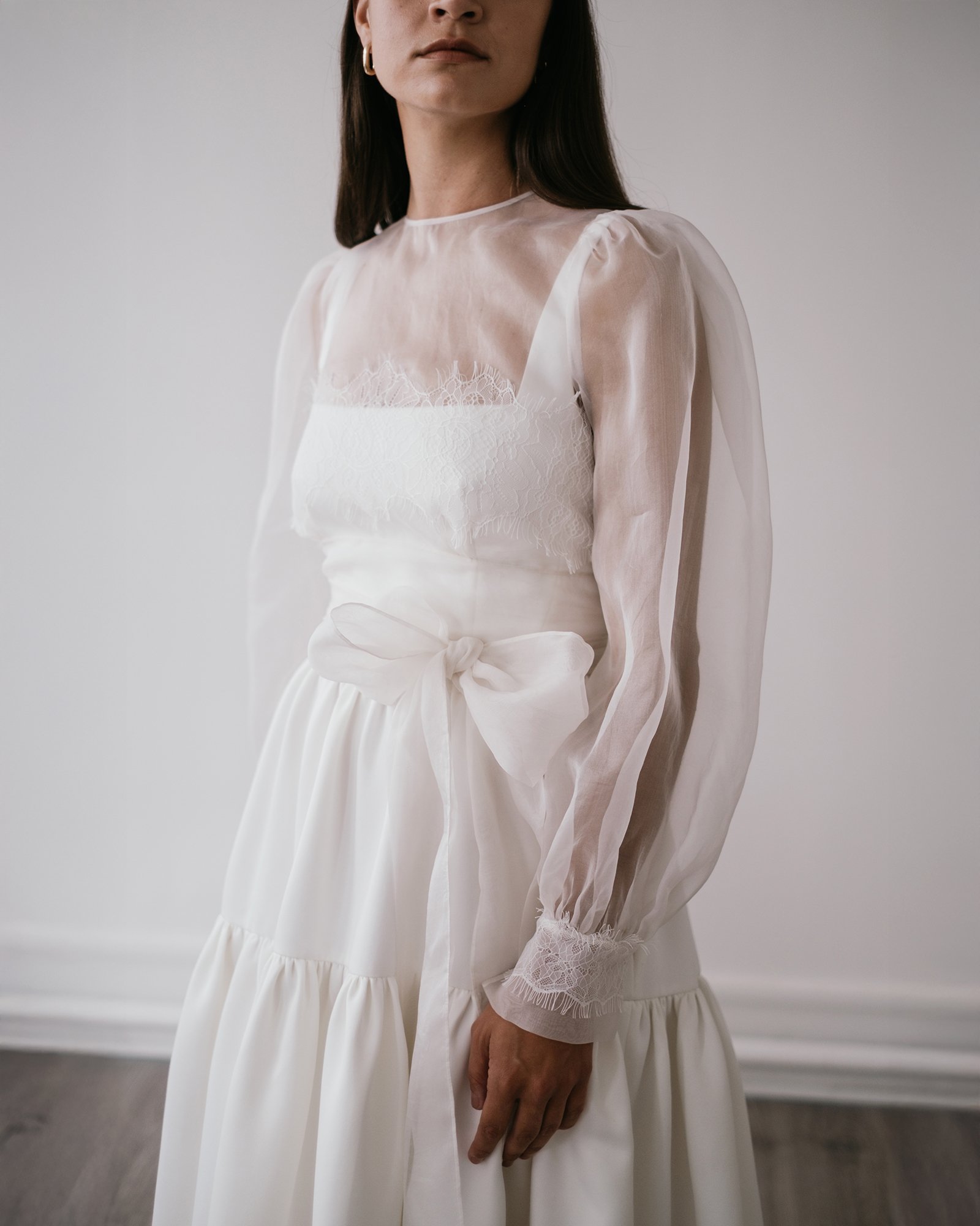 BRIDE WEARING SHEER ORGANZA LAYERING TOP TRIMMED IN LACE