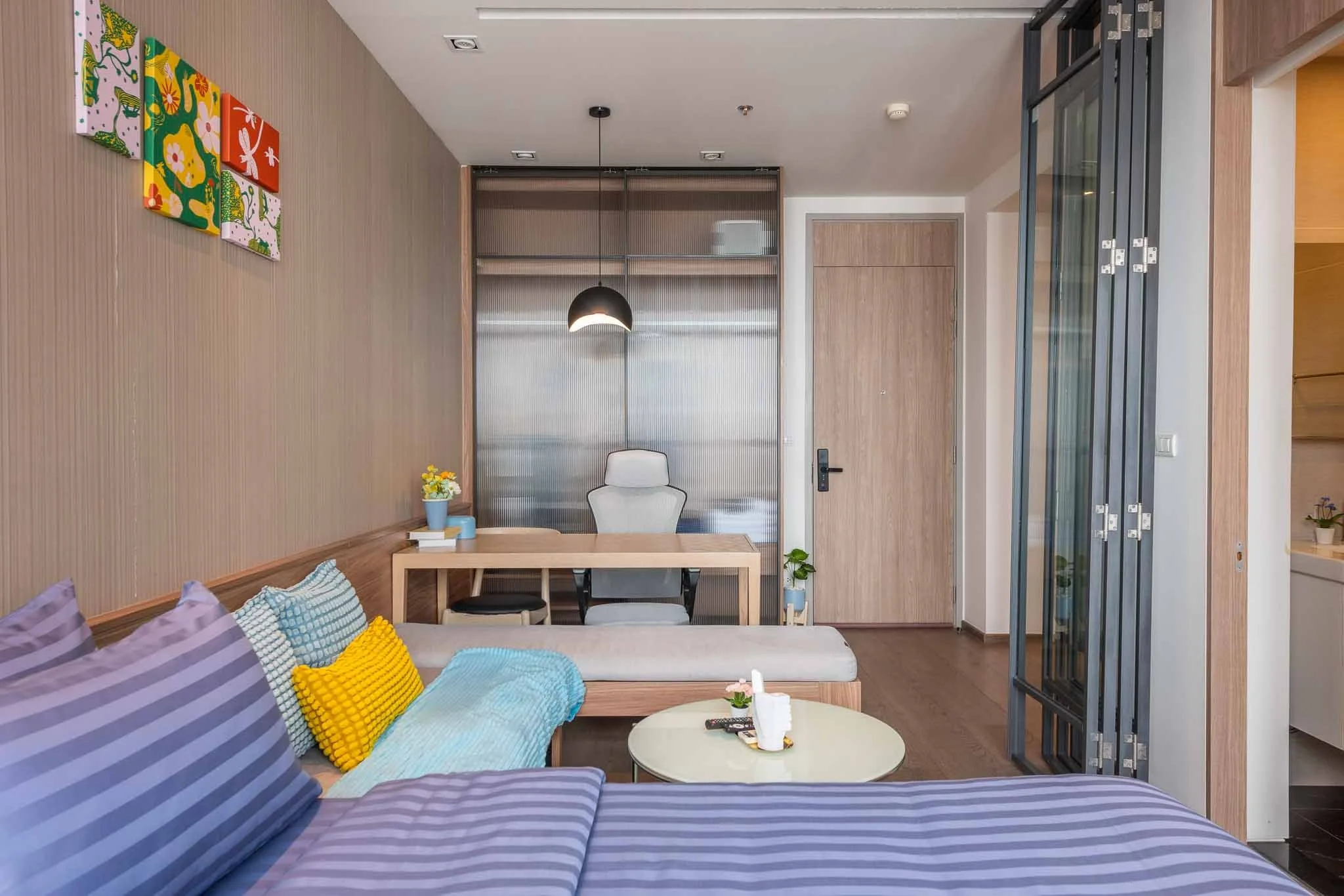 One-bedroom unit with a scenic balcony overlooking a green park in Sukhumvit.