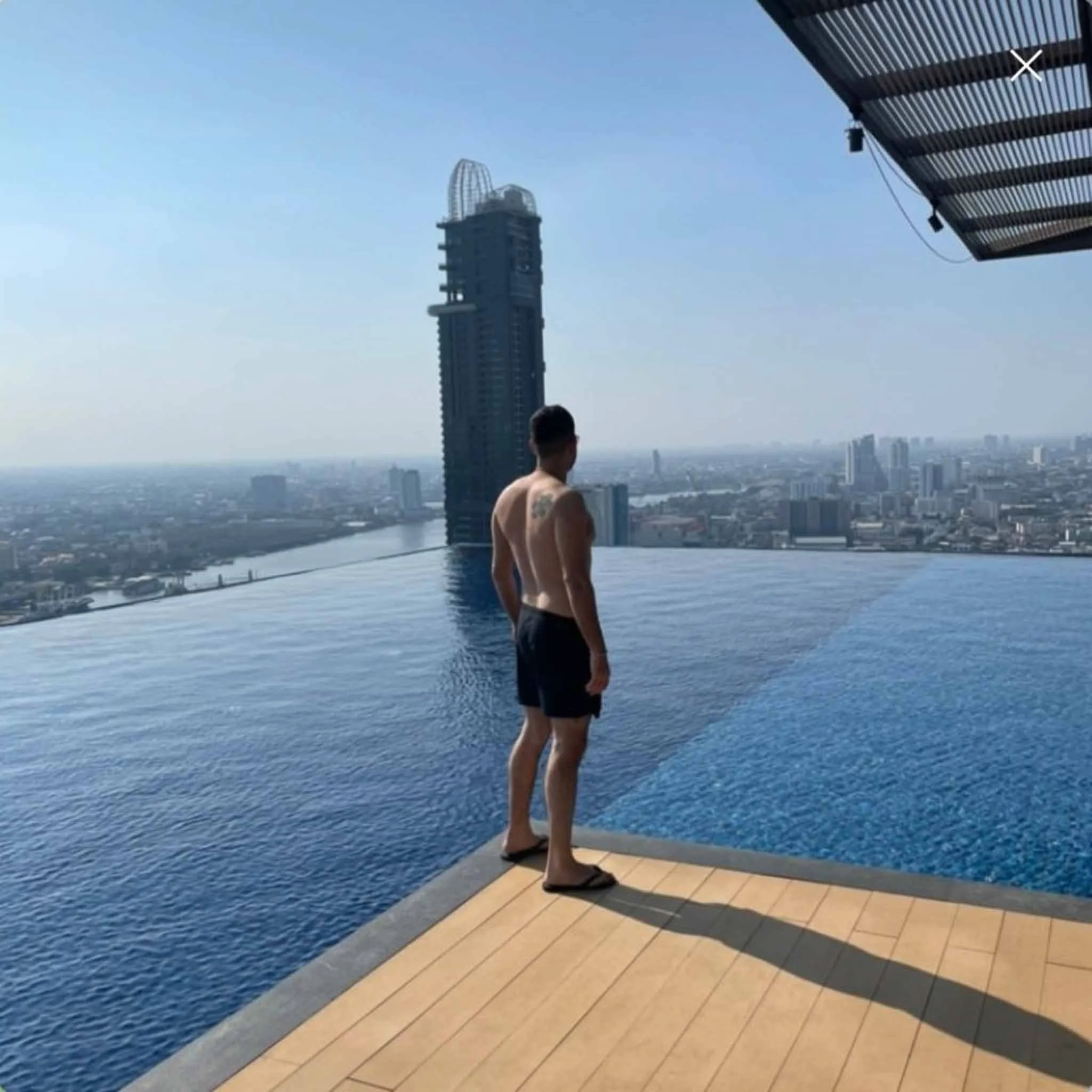 Apartment owner in a luxury swimming pool