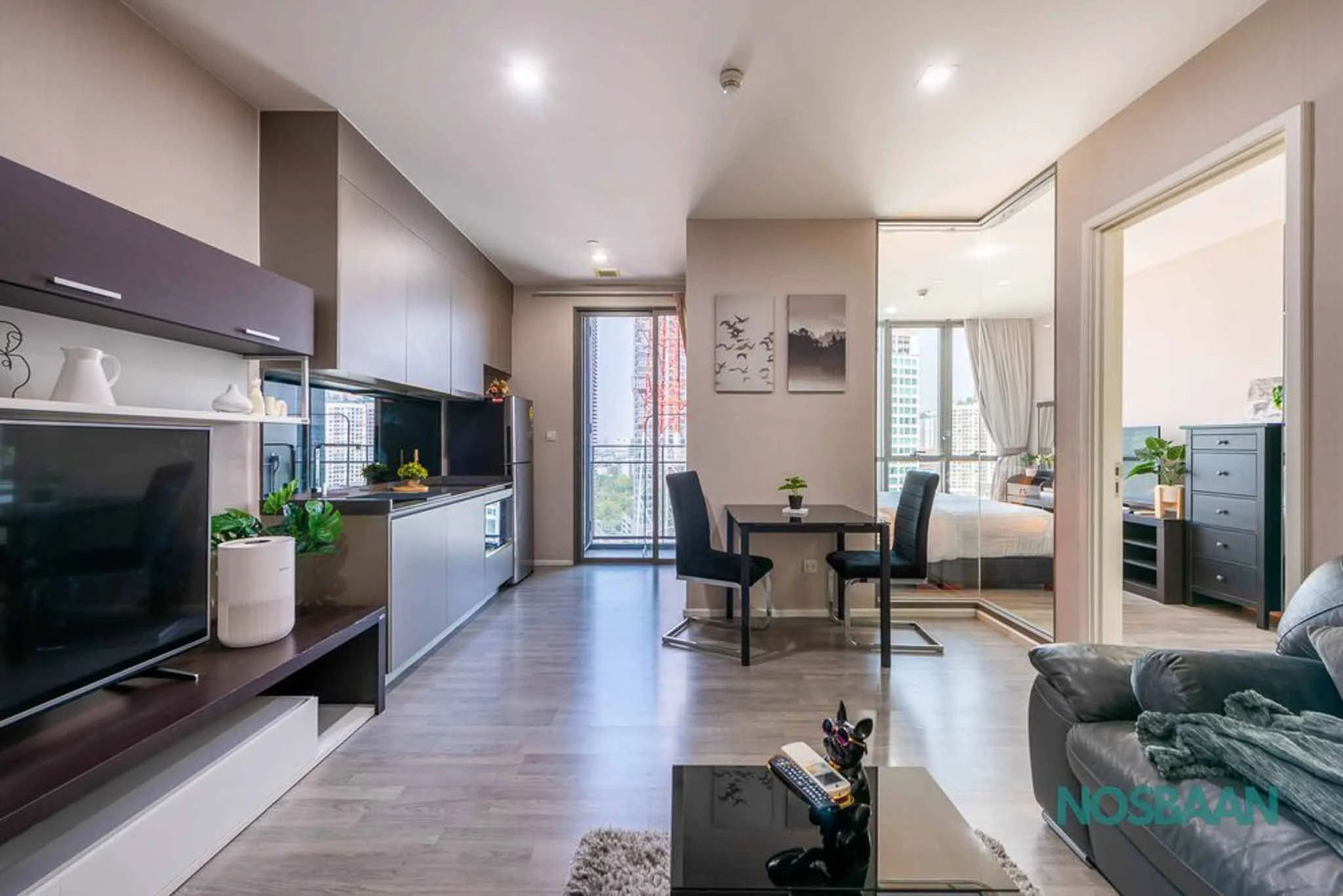 Luxury two-bedroom apartment with a shared swimming pool and gym facilities.