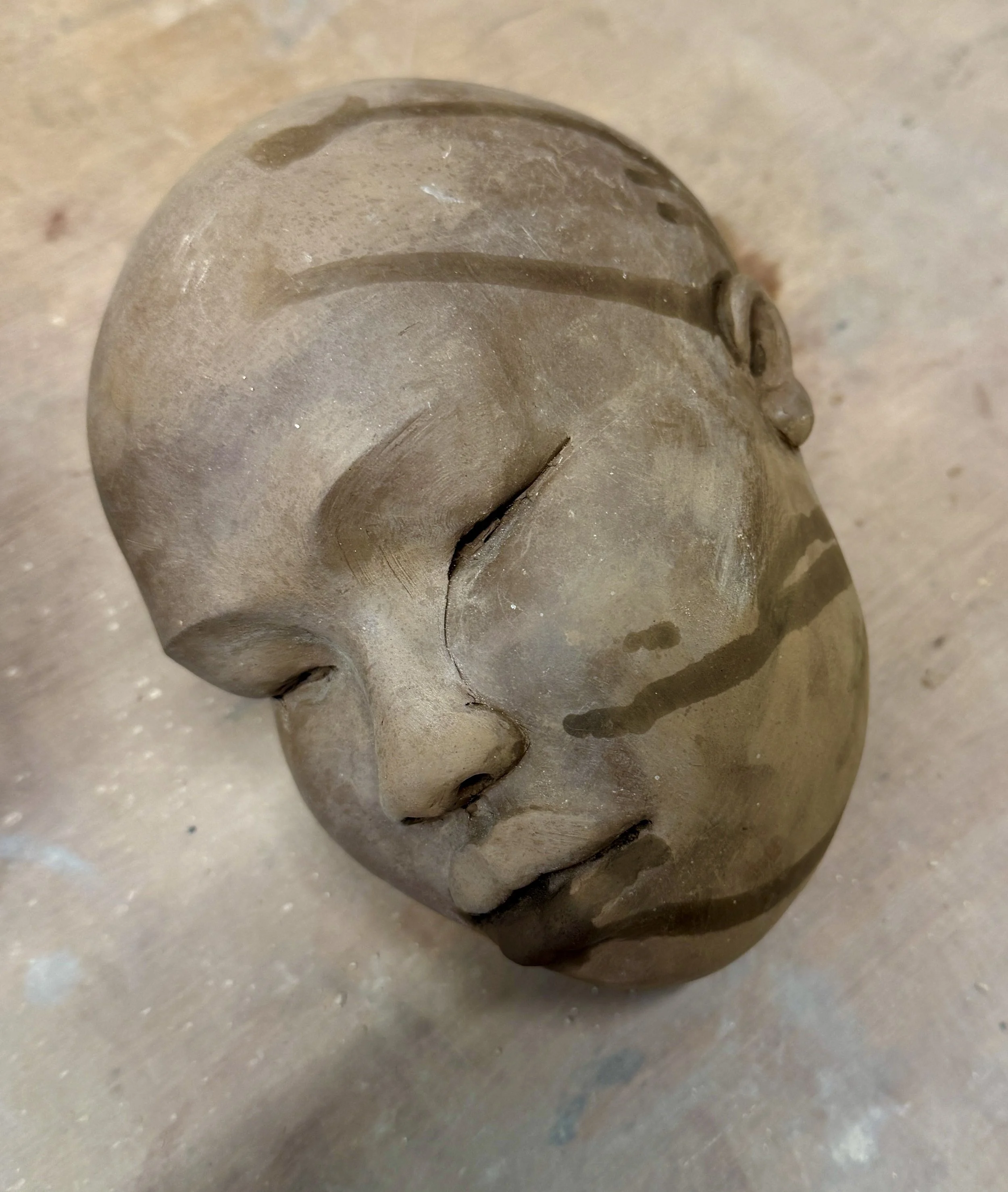 Tawny Phillips - dark brown clay head.JPG