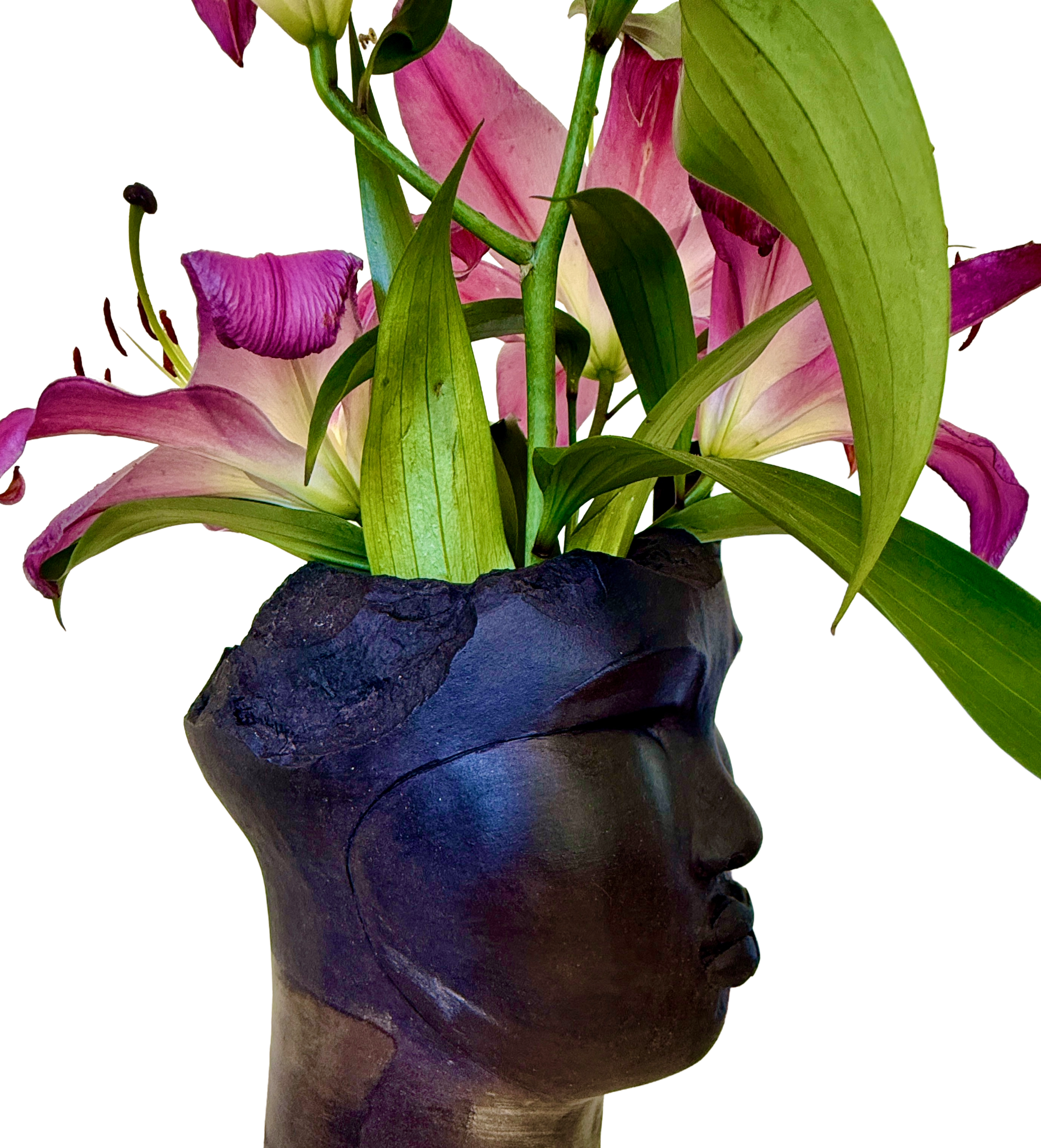 Tawny Phillips - close up of open head sculpture.png
