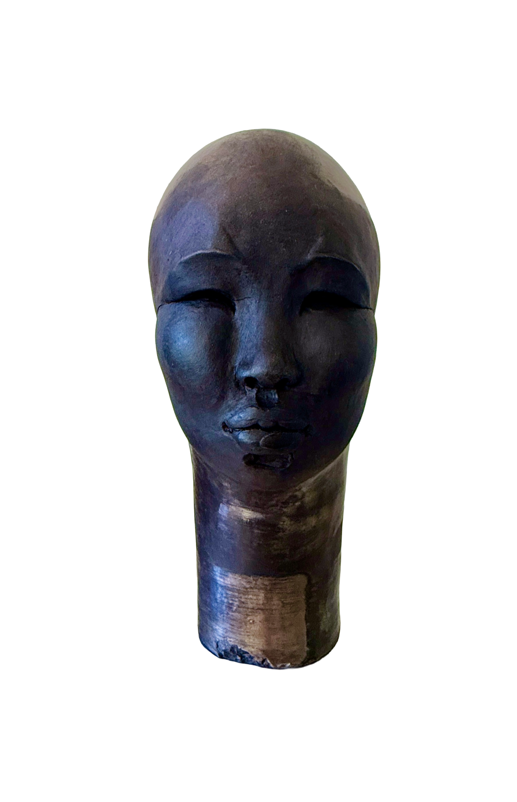 Tawny Phillips - black clay head with metallic glaze on neck.png