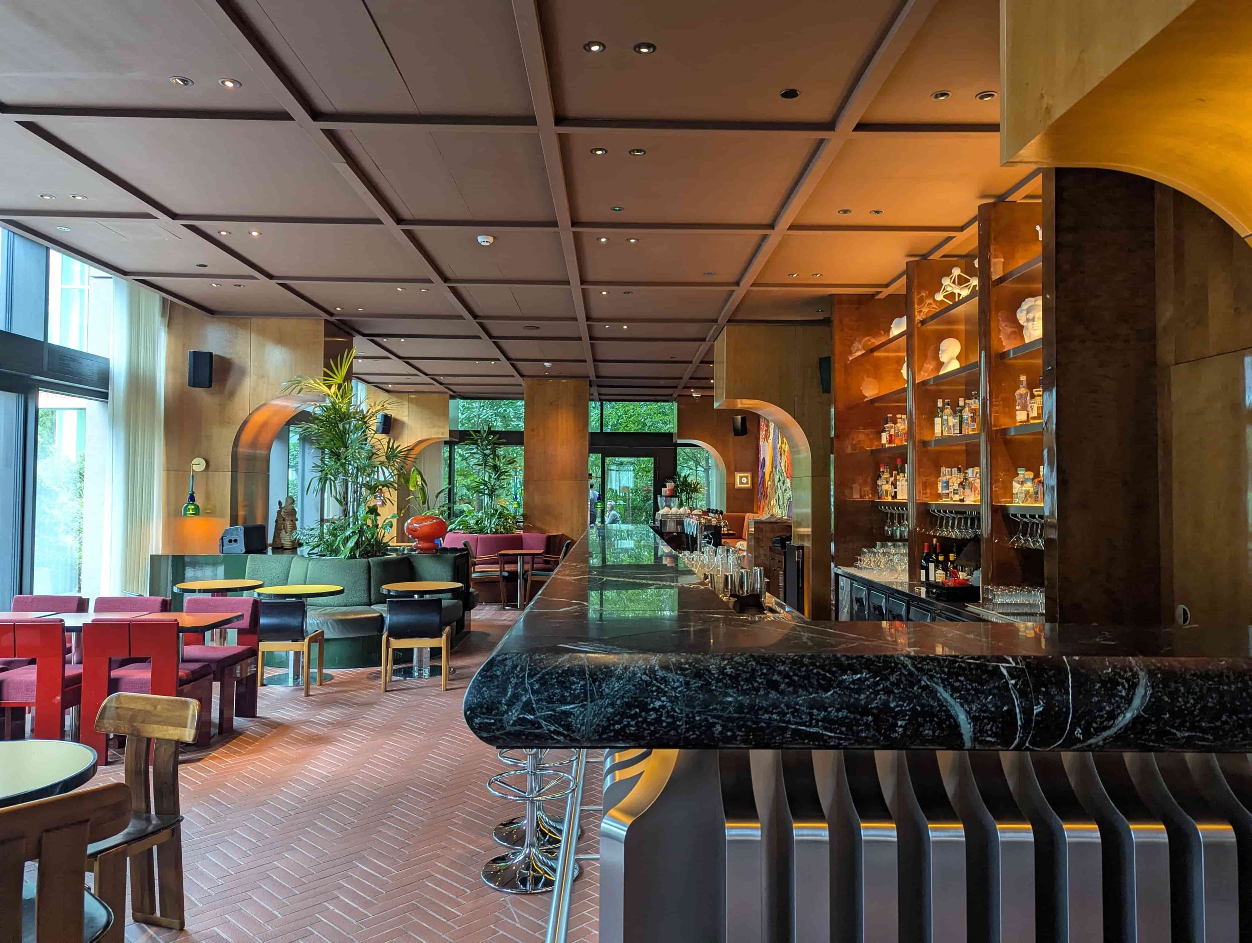 A restaurant with retro style interior design at the Standard Hotel Brussels