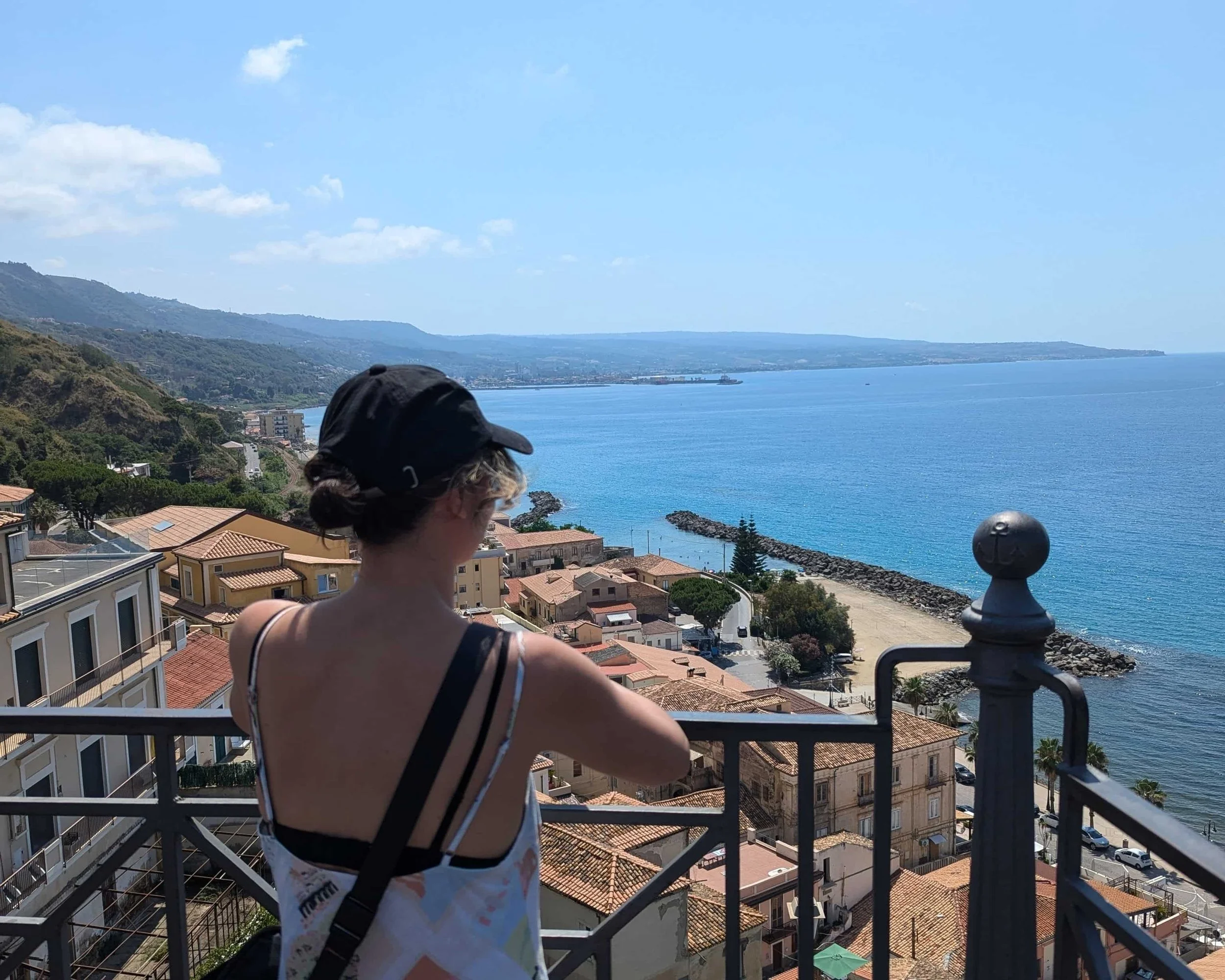 A woman overlooking the bay in Pizzo, Calabria