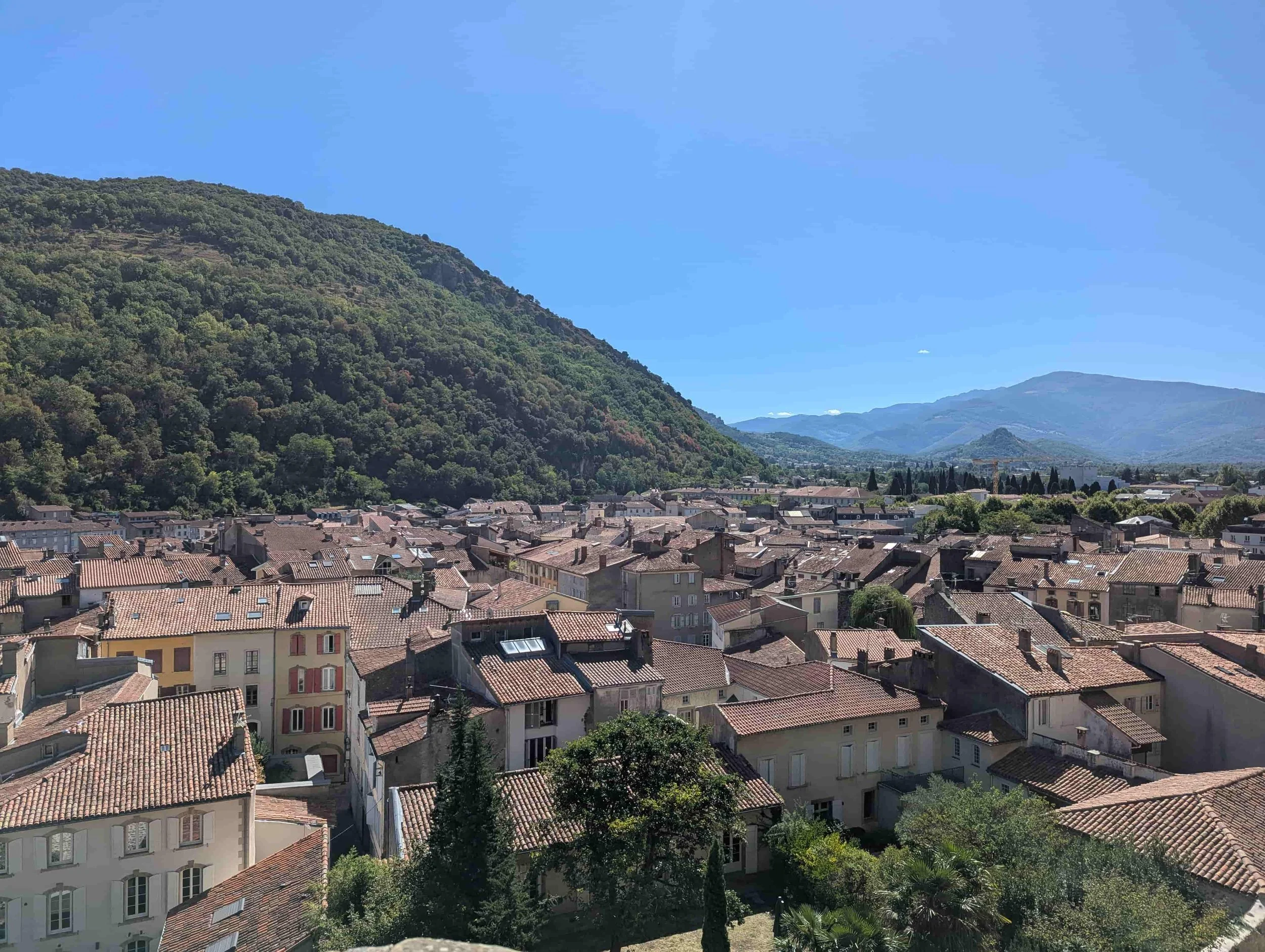 View on the historic centre of Foix and the surrounding mountains