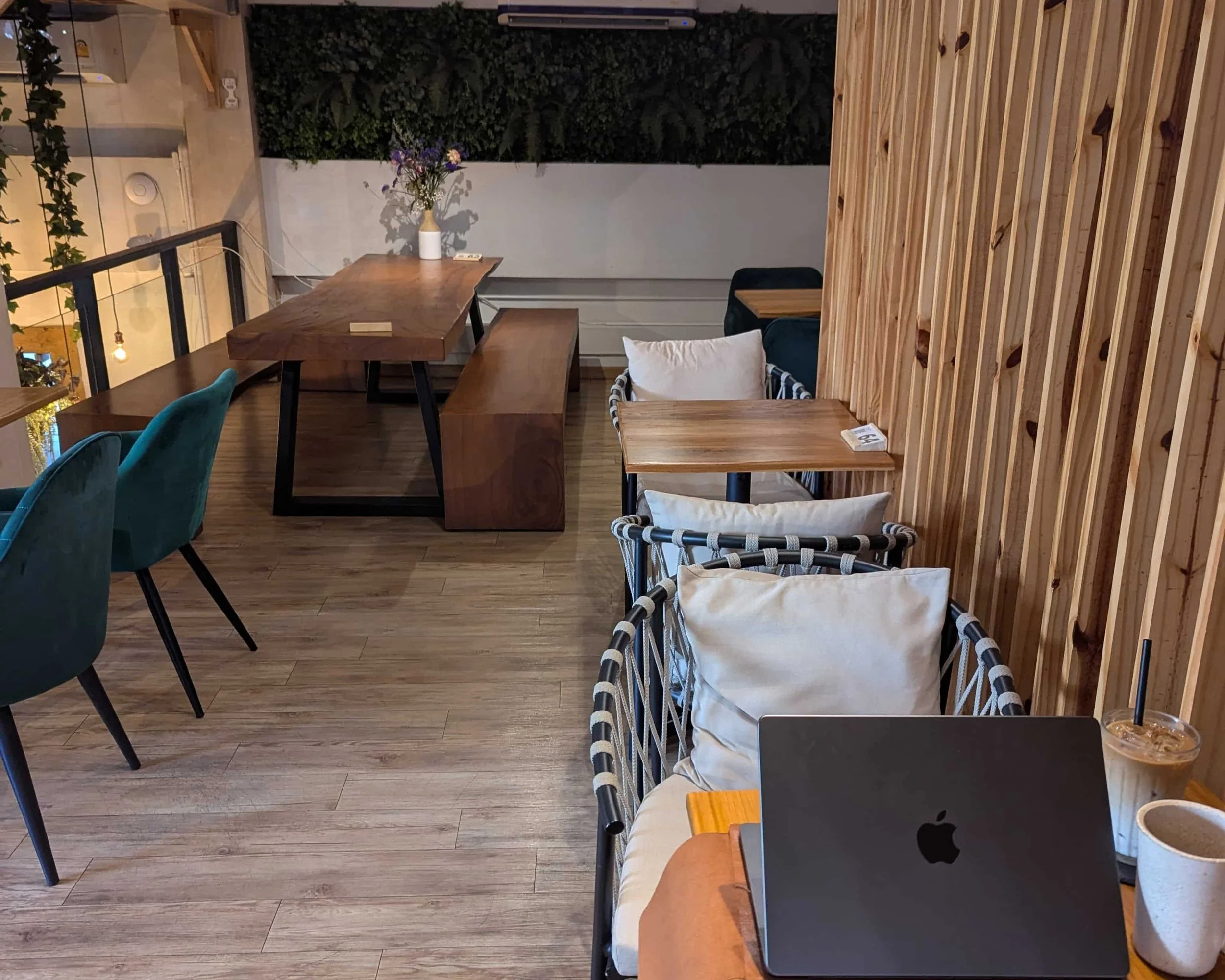 A cafe interior with tables and chairs