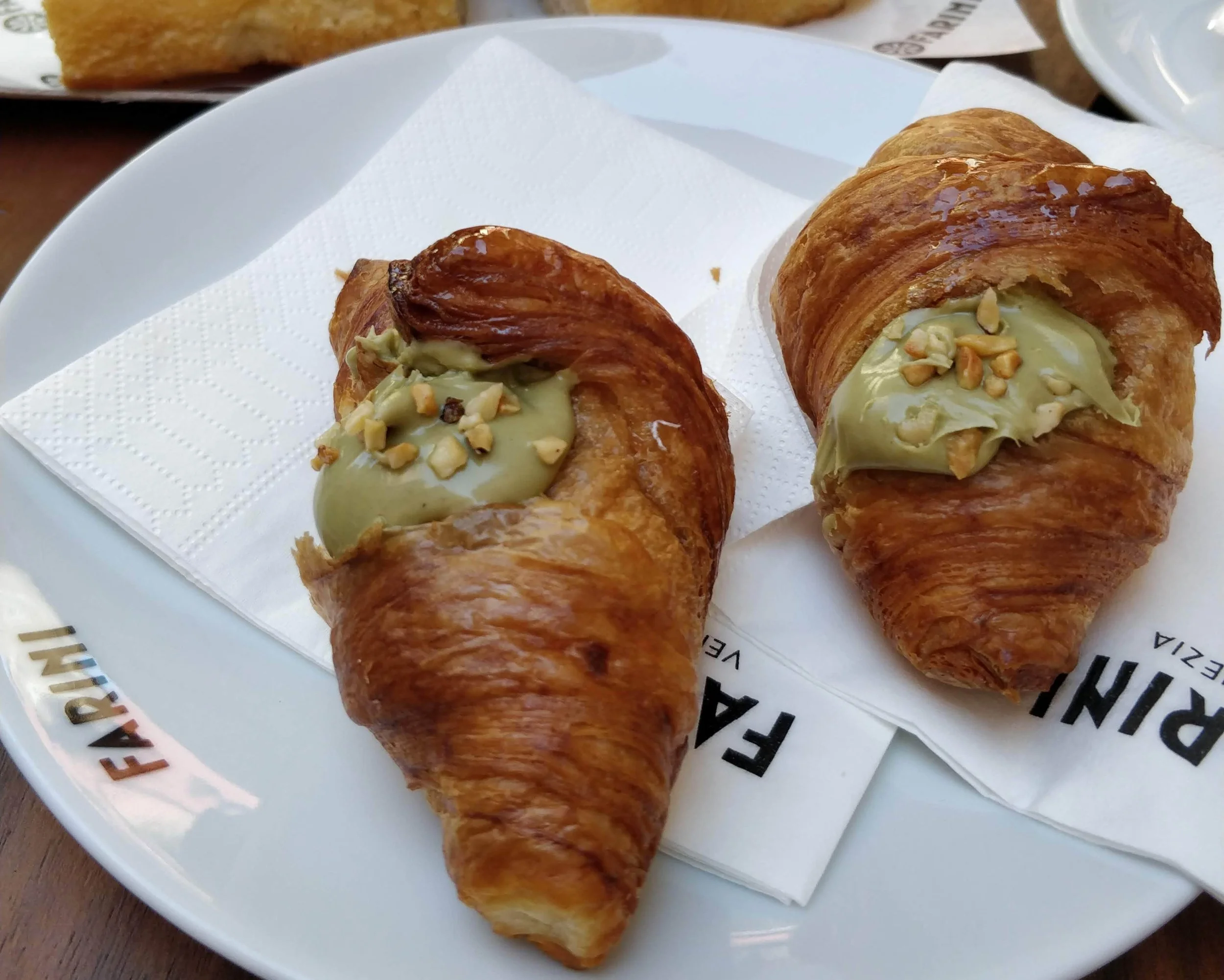 Italian Cornetti filled with pistachio cream
