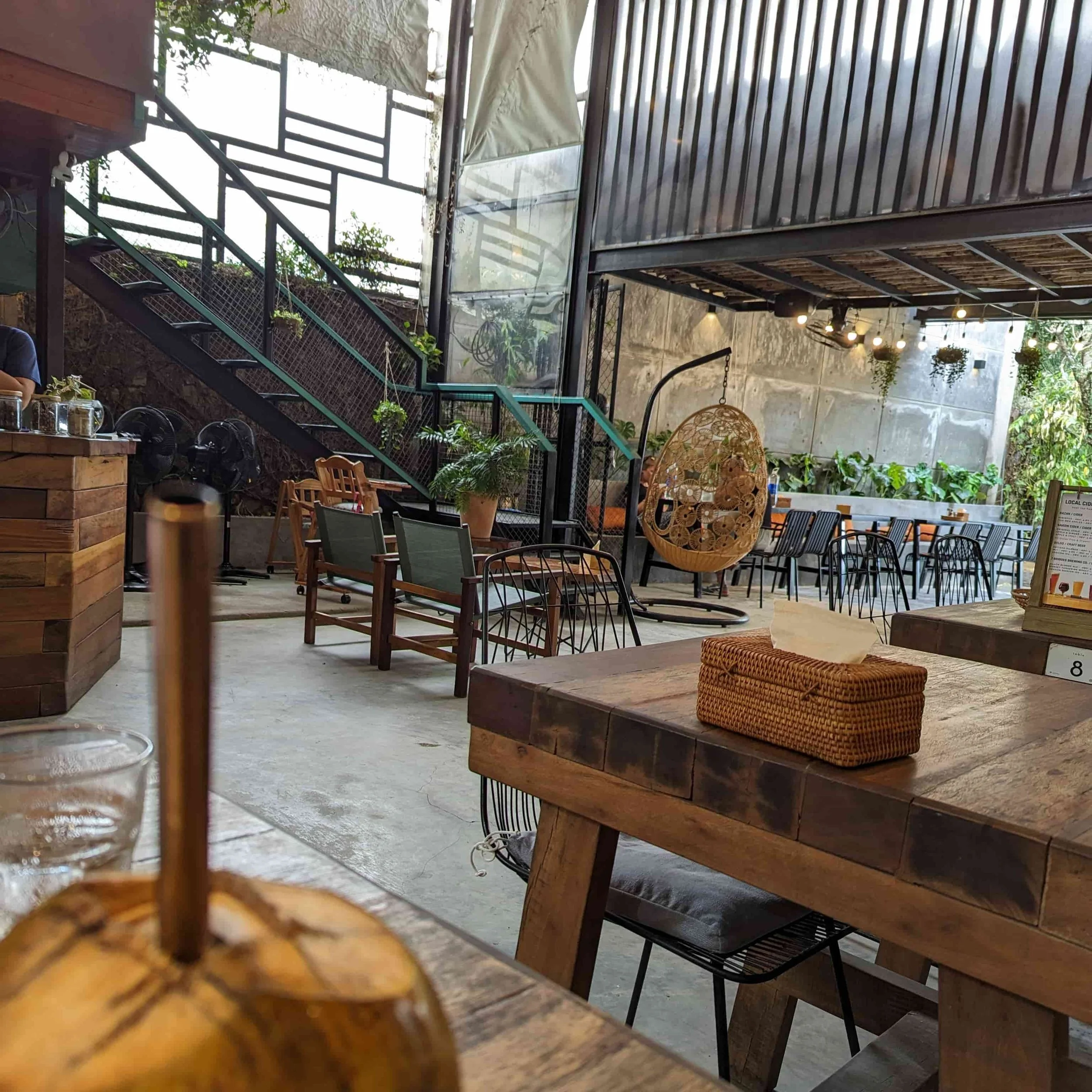 A cafe interior with view on a fresh coconut in Hoi An
