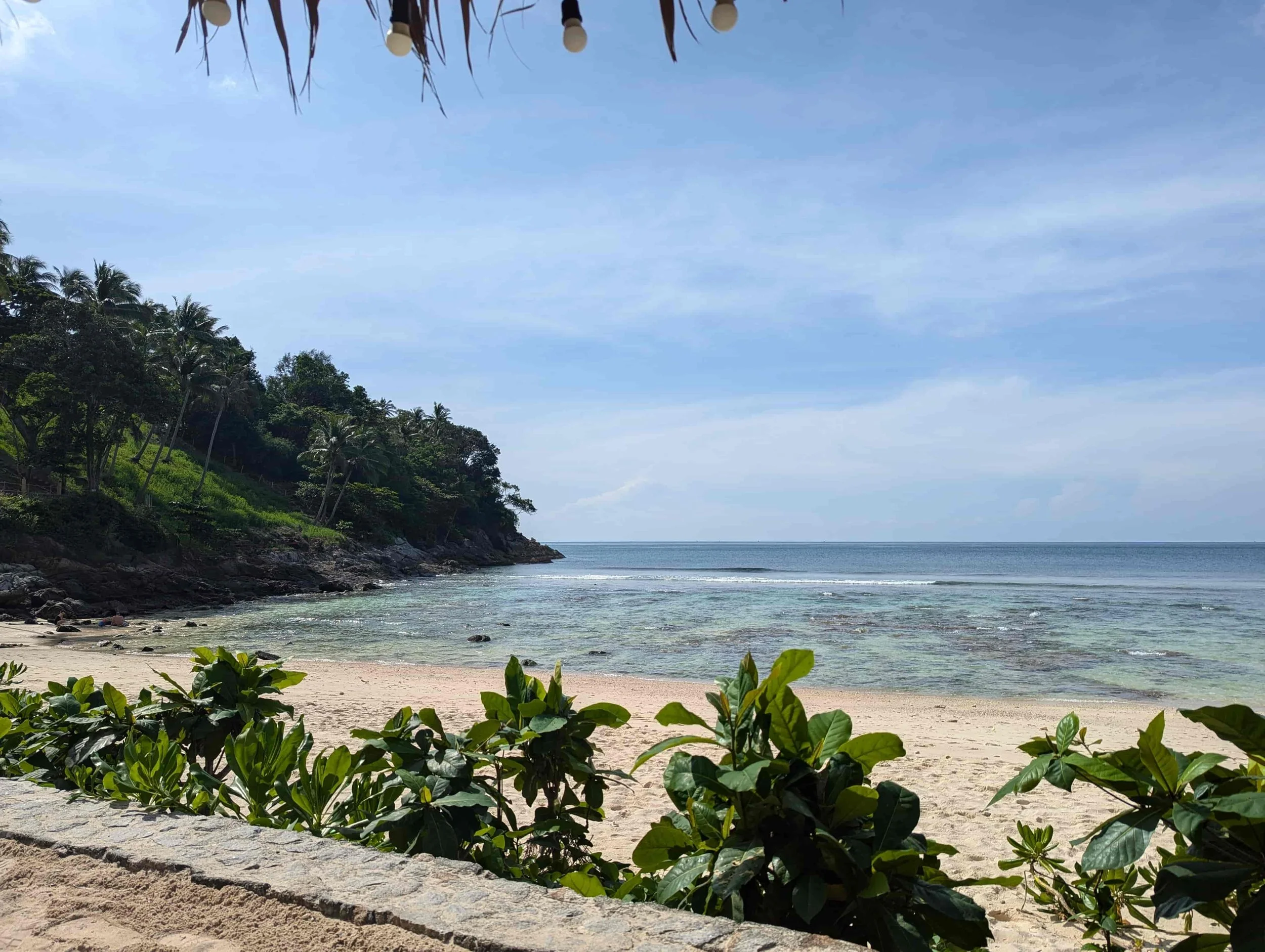 View on a beach with greenery at the Phuket Marriott Resort