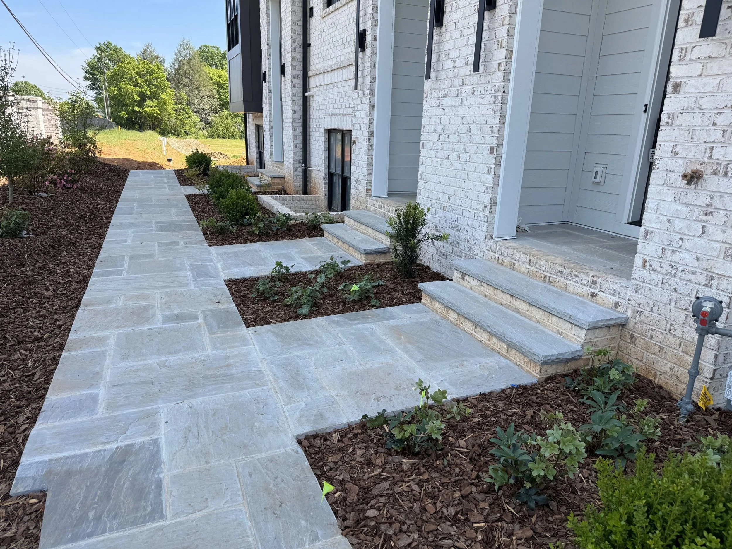 Granville-Homes-Castle-Grey-Natural-Cleft-Flagstone-Treads-scaled.jpg