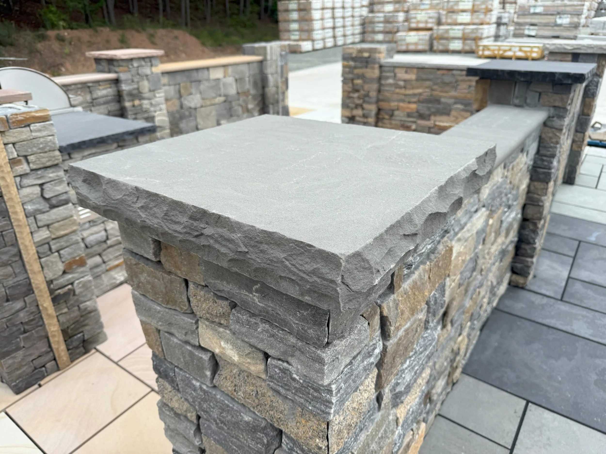 Blue-Stone-Wall-Cap-Flamed-Rockfaced-Edge-scaled.jpg