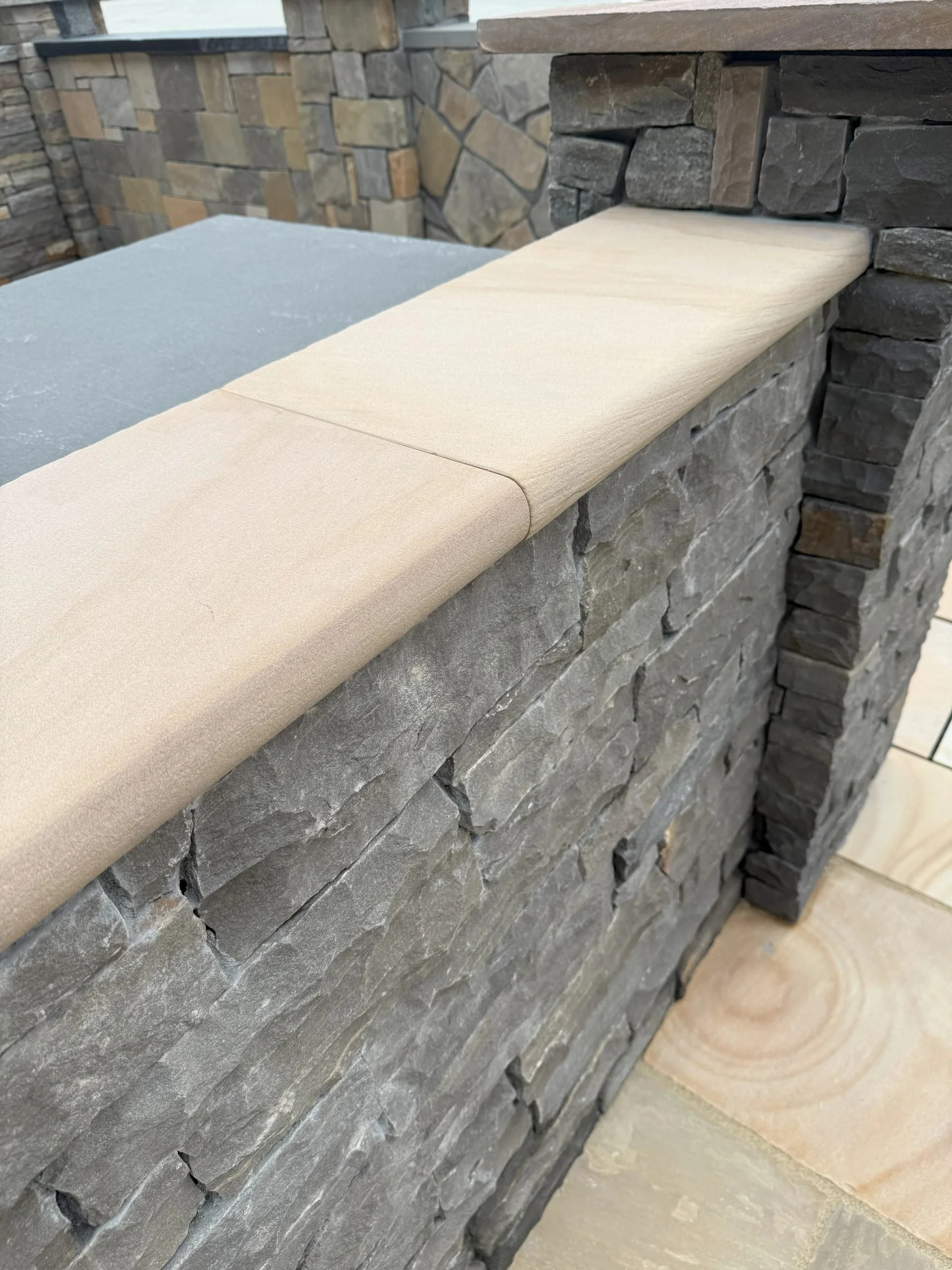 Buff-Wall-Cap-Sawn-Sandblasted-Bullnosed-Edge-scaled.jpg