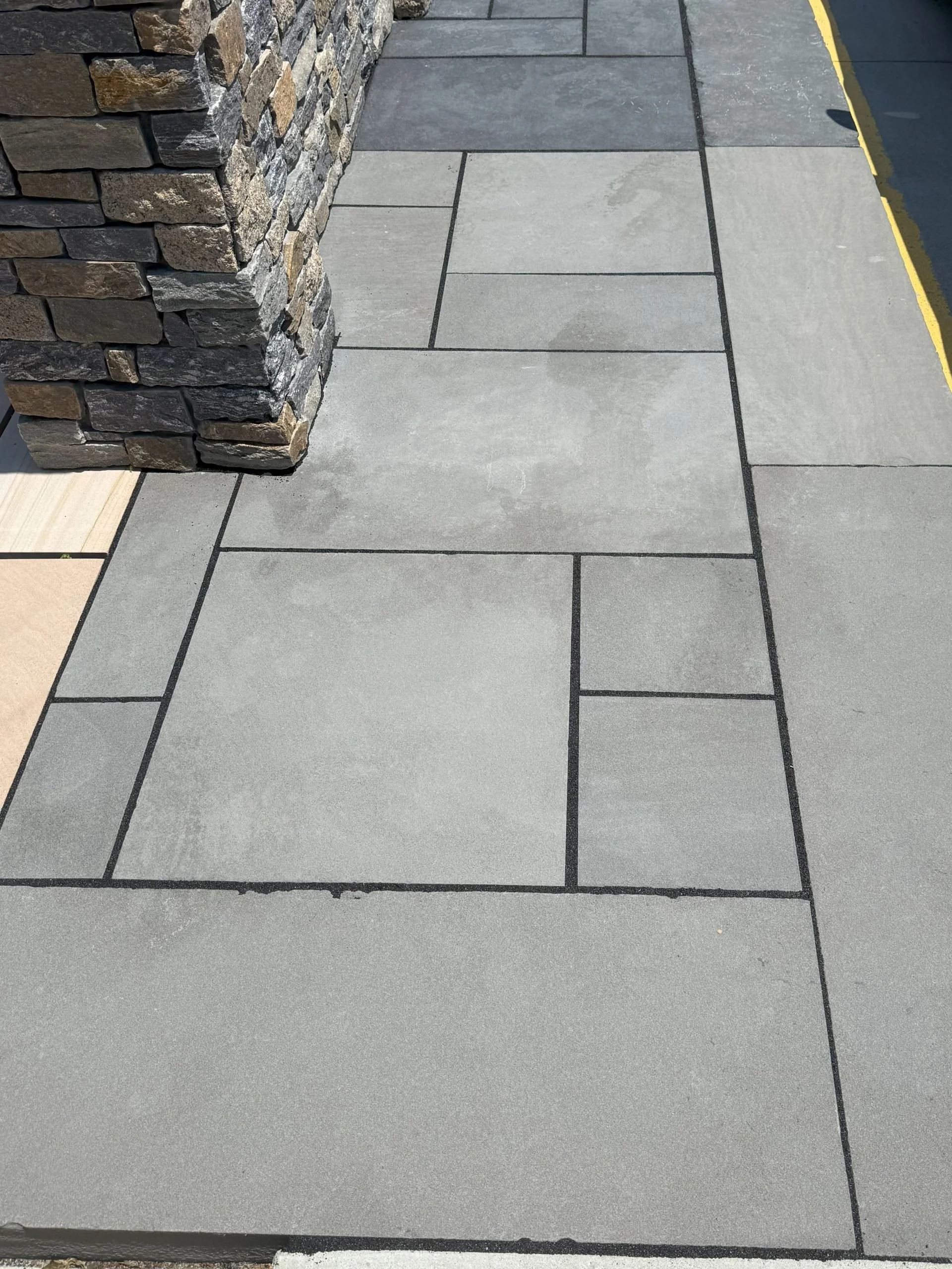 Blue-Stone-Flagstone-Sawn-Flamed-Sawn-Edge-scaled.jpg