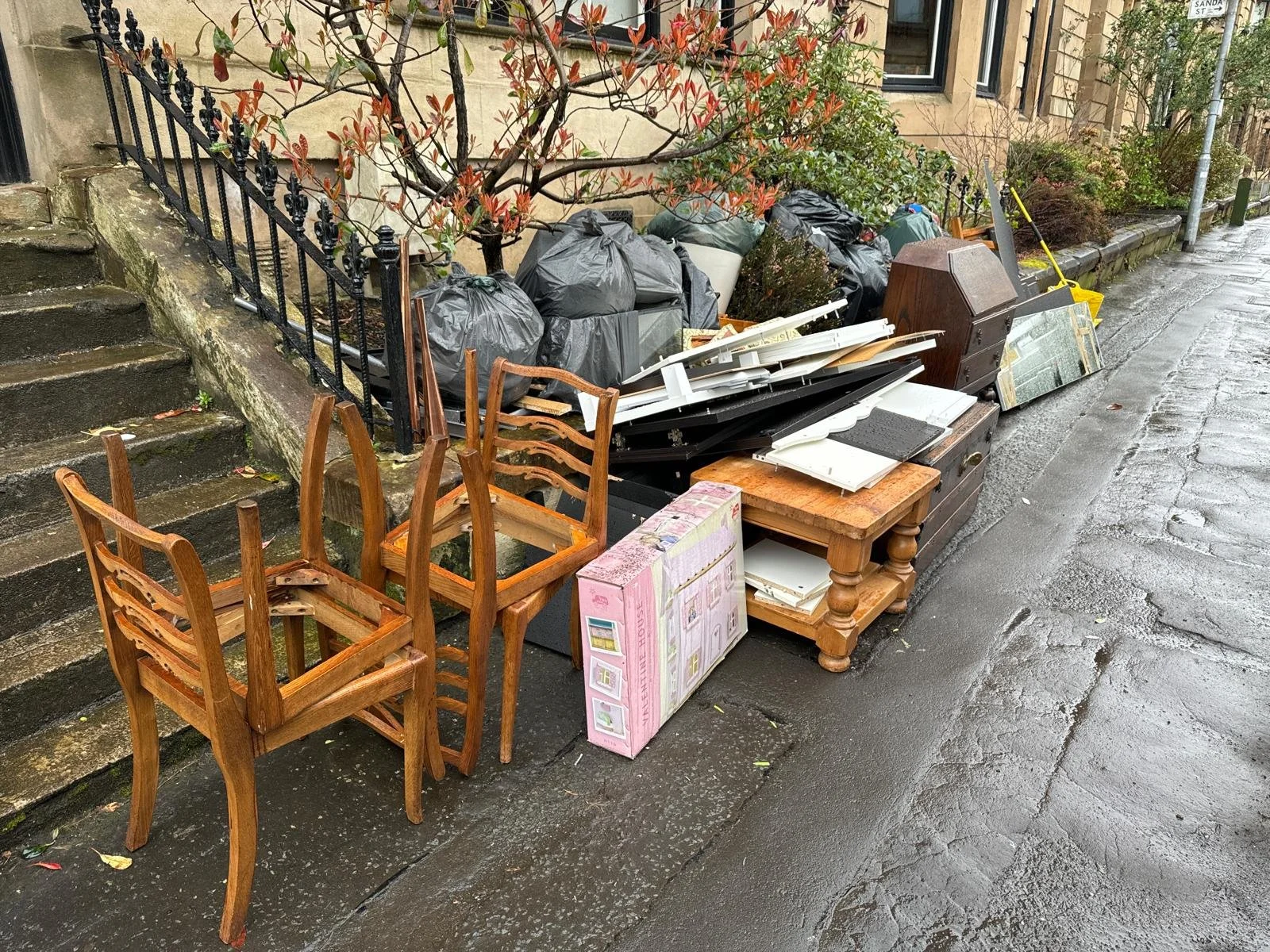 Household rubbish and furniture piled up in Glasgow