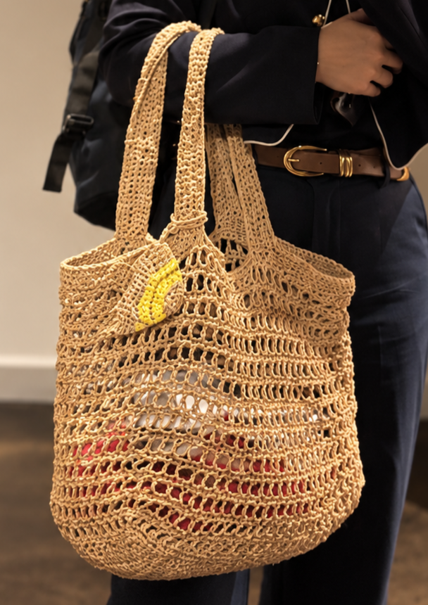 Chic+Navy+Suit+with+Raffia+Tote.png