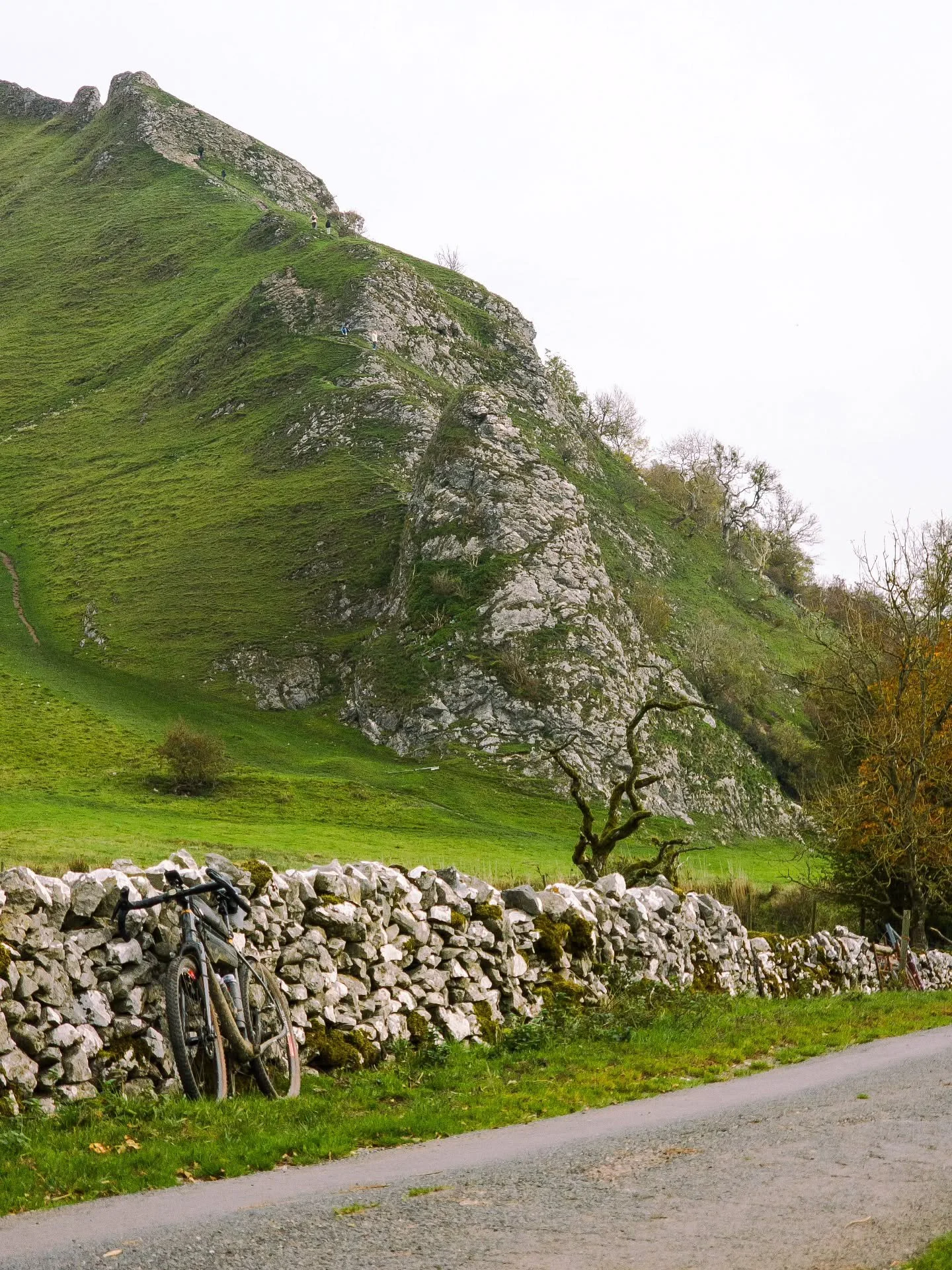 LOOK BACK 👀
Scroll down far enough on our page, and you&rsquo;ll find a shot just like this one.
Same bike. Same trails. Same love for the ride.

Back then, we had no idea if Tor Divide would just be a ride with a few mates or something more.
Three 