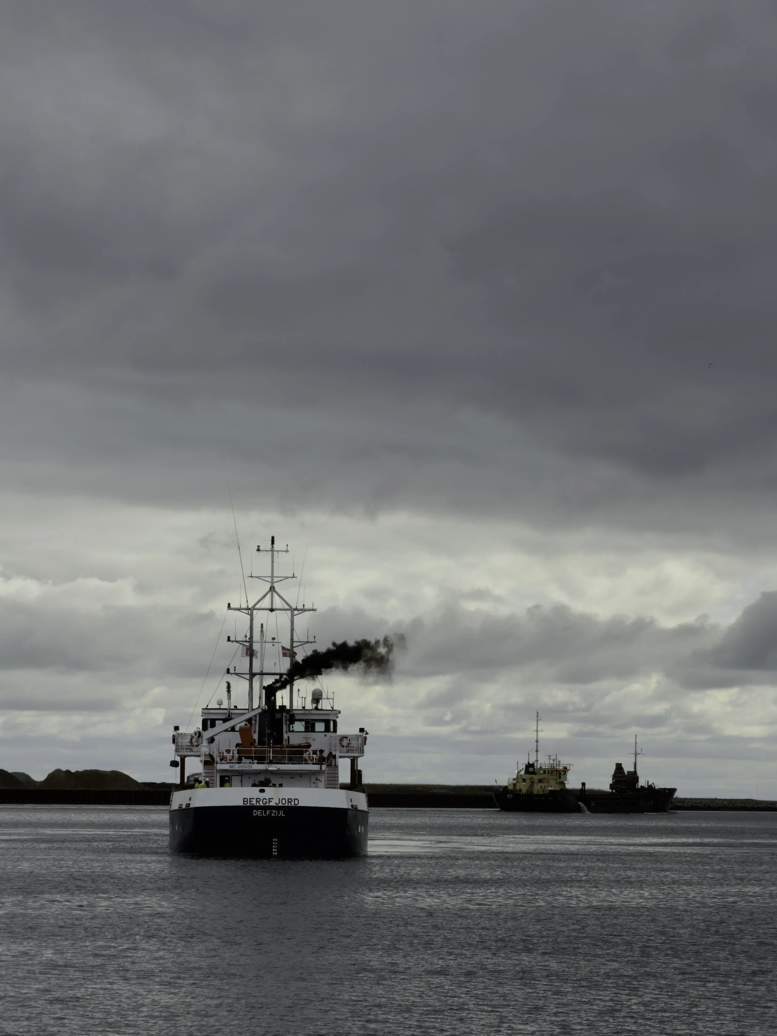 Bjergfjord maneuving into the harbour as Baltic makes it's way out - Køge, Denmark