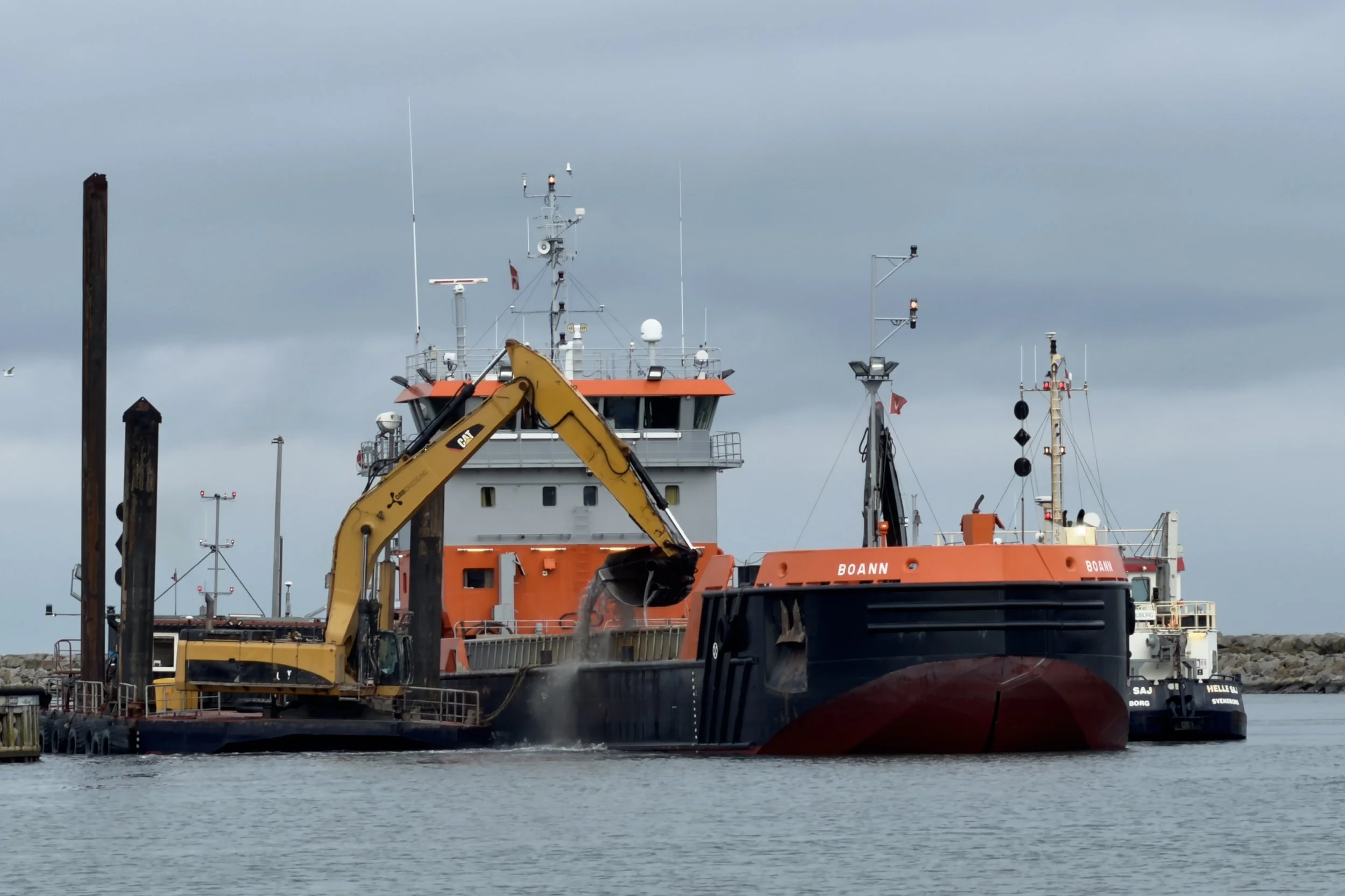 Boann and accompanying dredgers maintain the harbour - Køge, Denmark 
