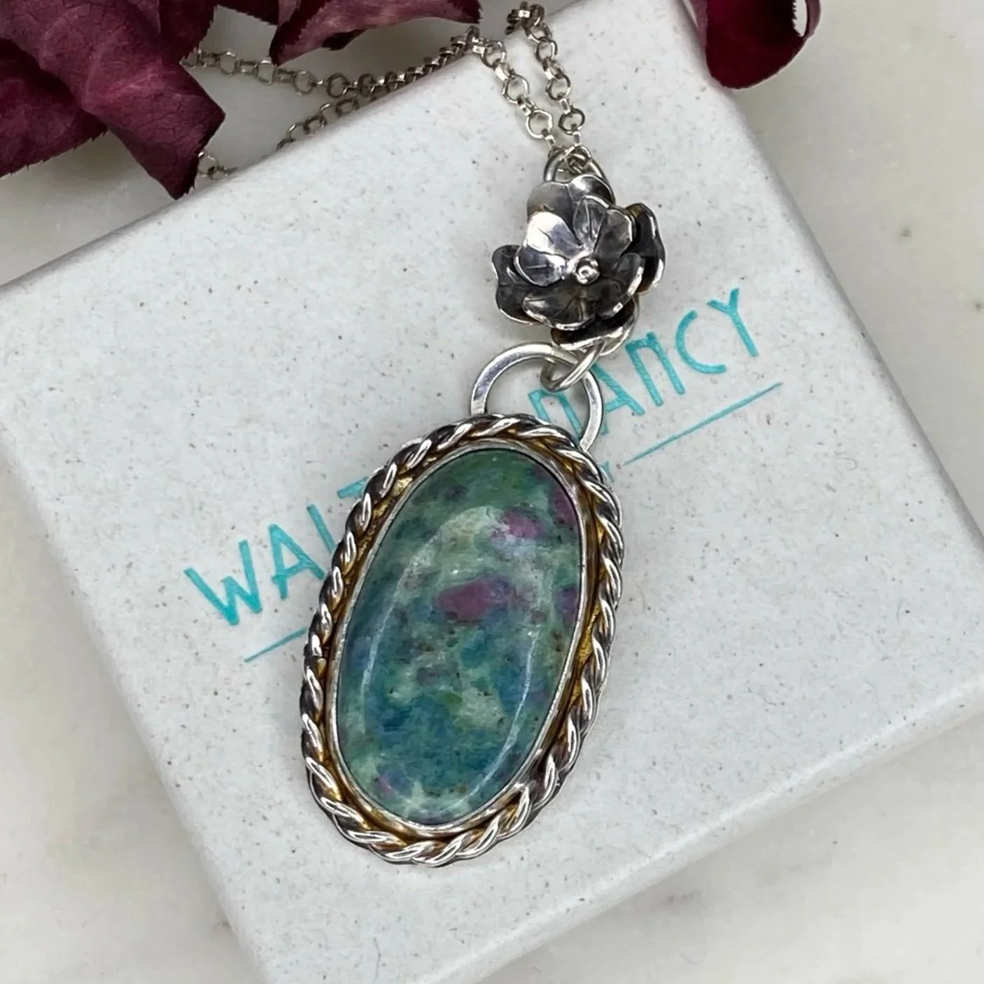 A beautiful Ruby Fuchsite stone set in a handcrafted sterling silver setting. The setting has been hallmarked in London. The piece has been designed and made by Rosie at Walter and Nancy Jewellery.