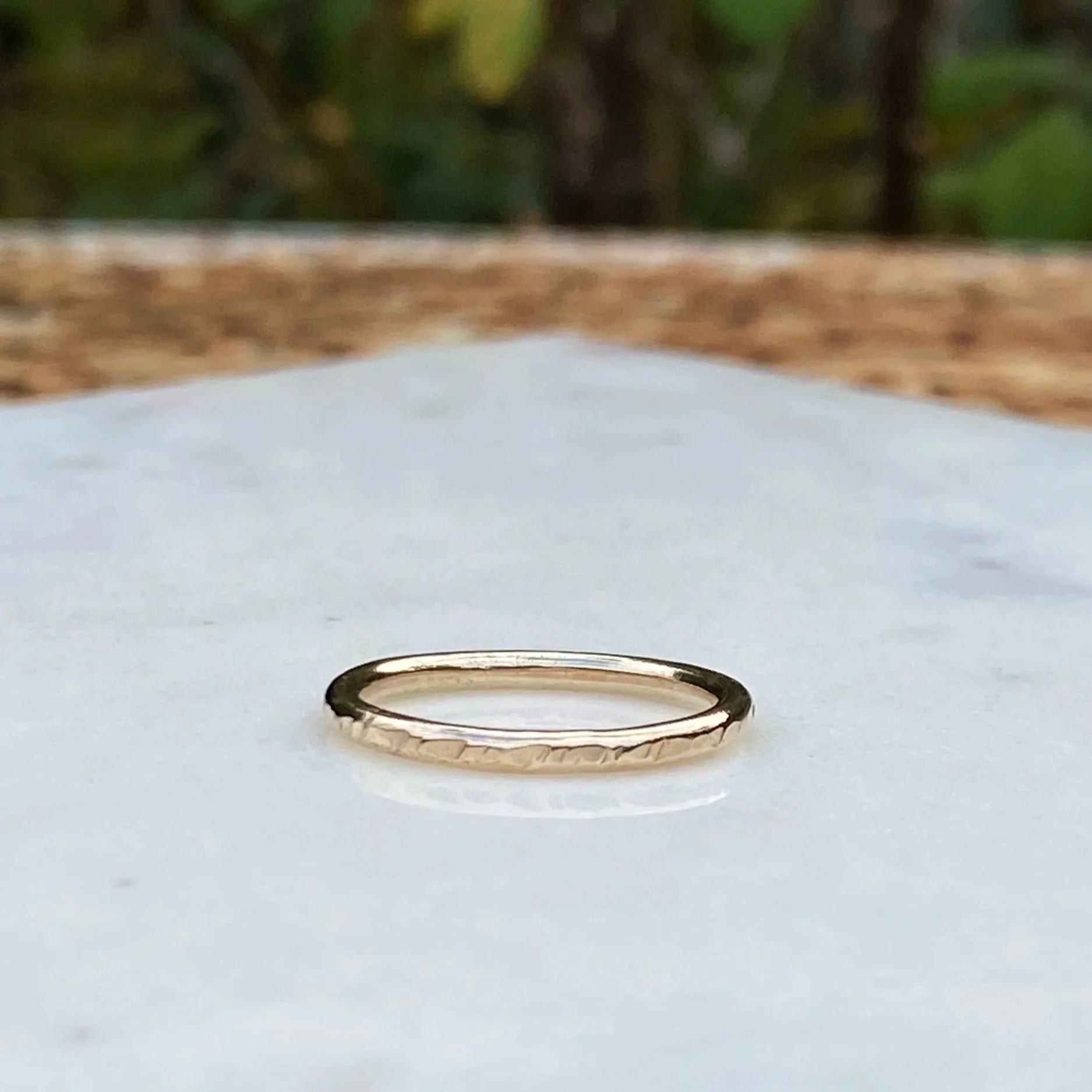 2mm wide 9ct Gold ring, handcrafted by Walter and Nancy Jewellery. Gently textured gold band handmade with love.