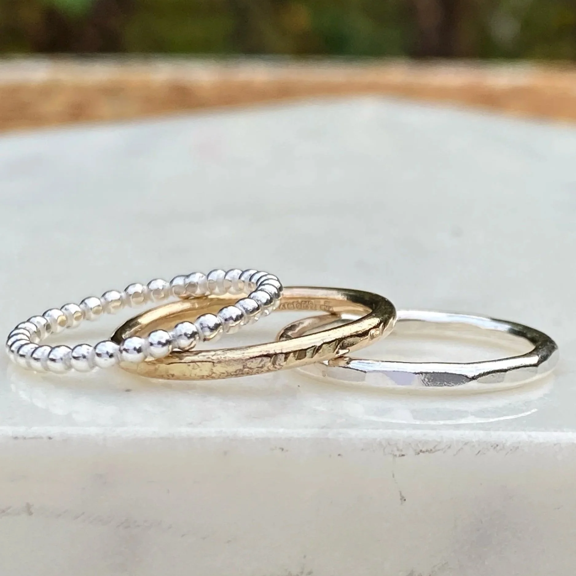 2mm wide 9ct Gold ring, handcrafted by Walter and Nancy Jewellery. Gently textured gold band handmade with love.