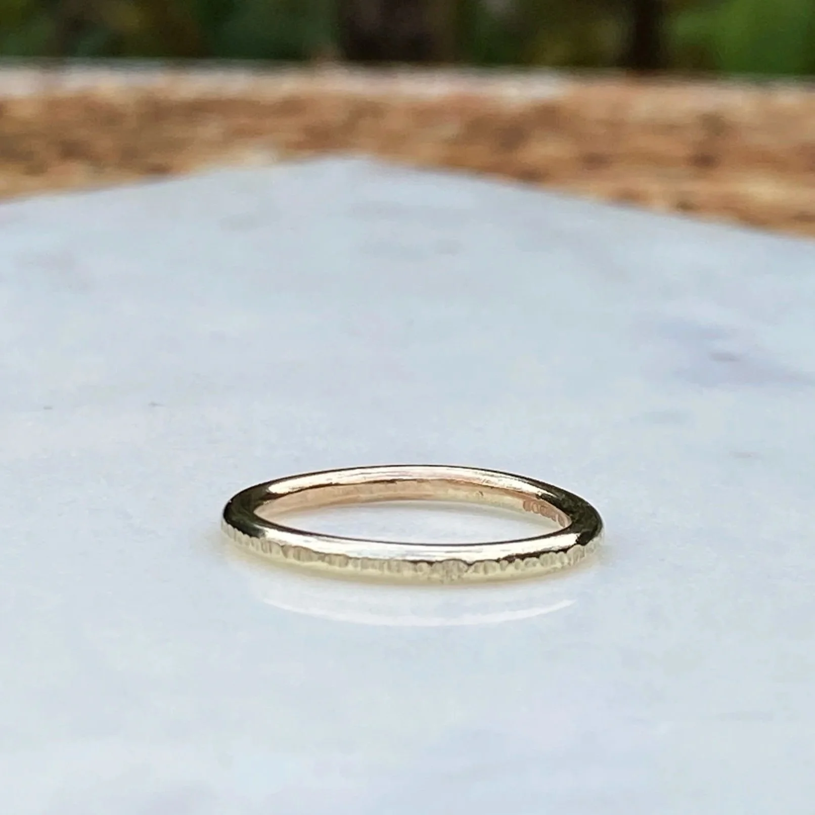 2mm wide 9ct Gold ring, handcrafted by Walter and Nancy Jewellery. Gently textured gold band handmade with love.