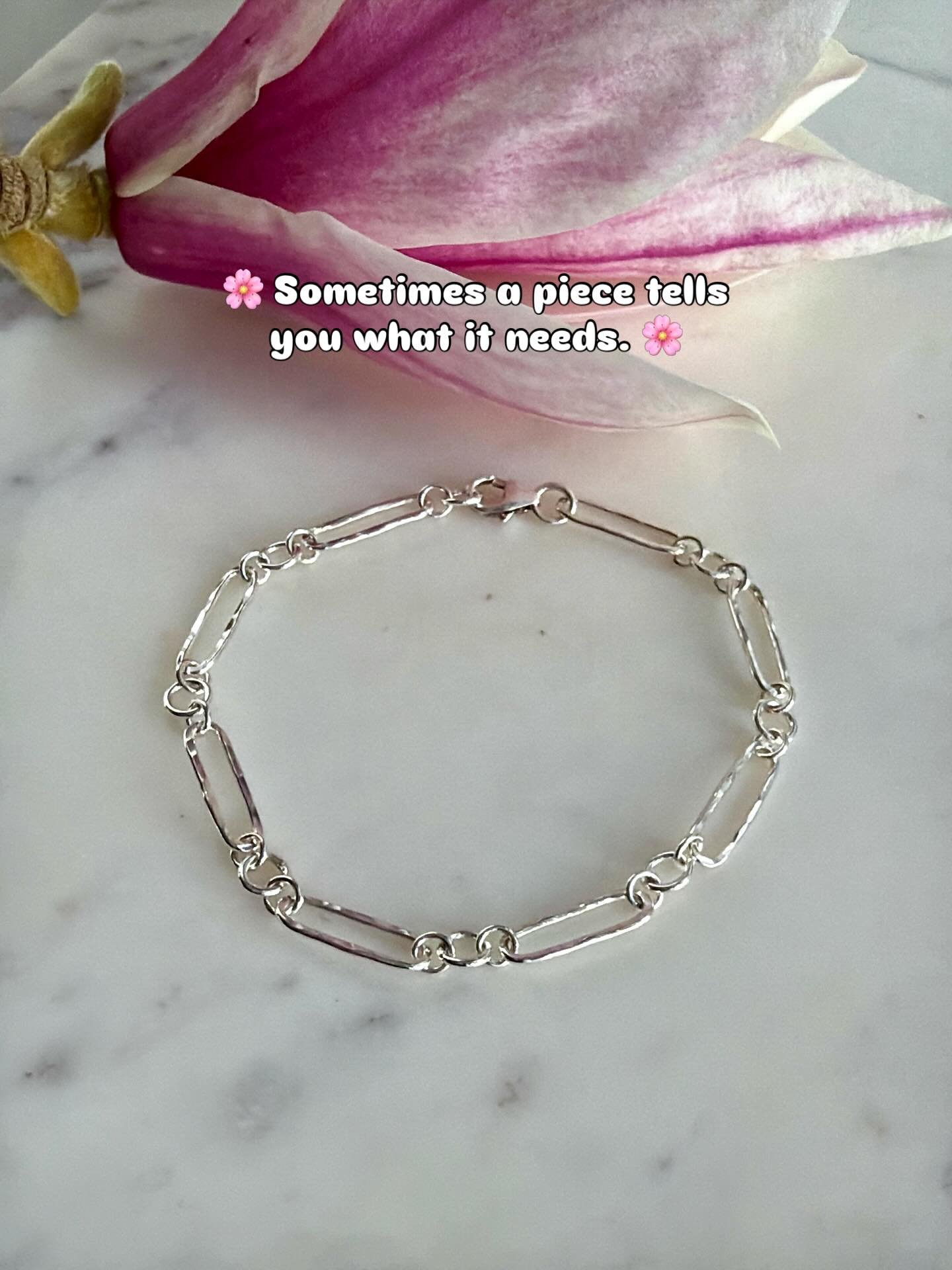 🌸 Sometimes a piece tells you what it needs. 🌸

This handmade sterling silver bracelet started life as a simple chain of softly hammered links. I liked it&hellip; but it felt like something was missing.

So I made a tiny sterling silver flower and 