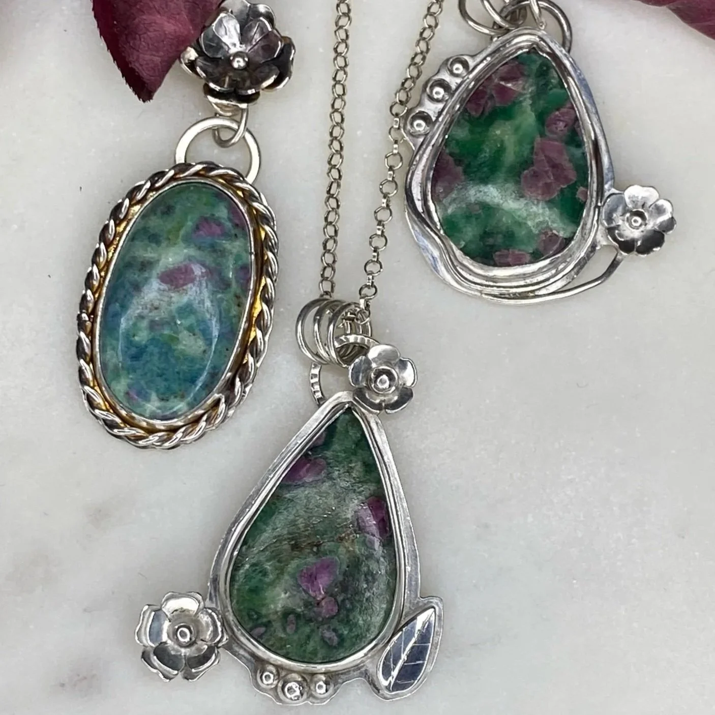 A beautiful Ruby Fuchsite stone set in a handcrafted sterling silver setting. The setting has been hallmarked in London. The piece has been designed and made by Rosie at Walter and Nancy Jewellery.