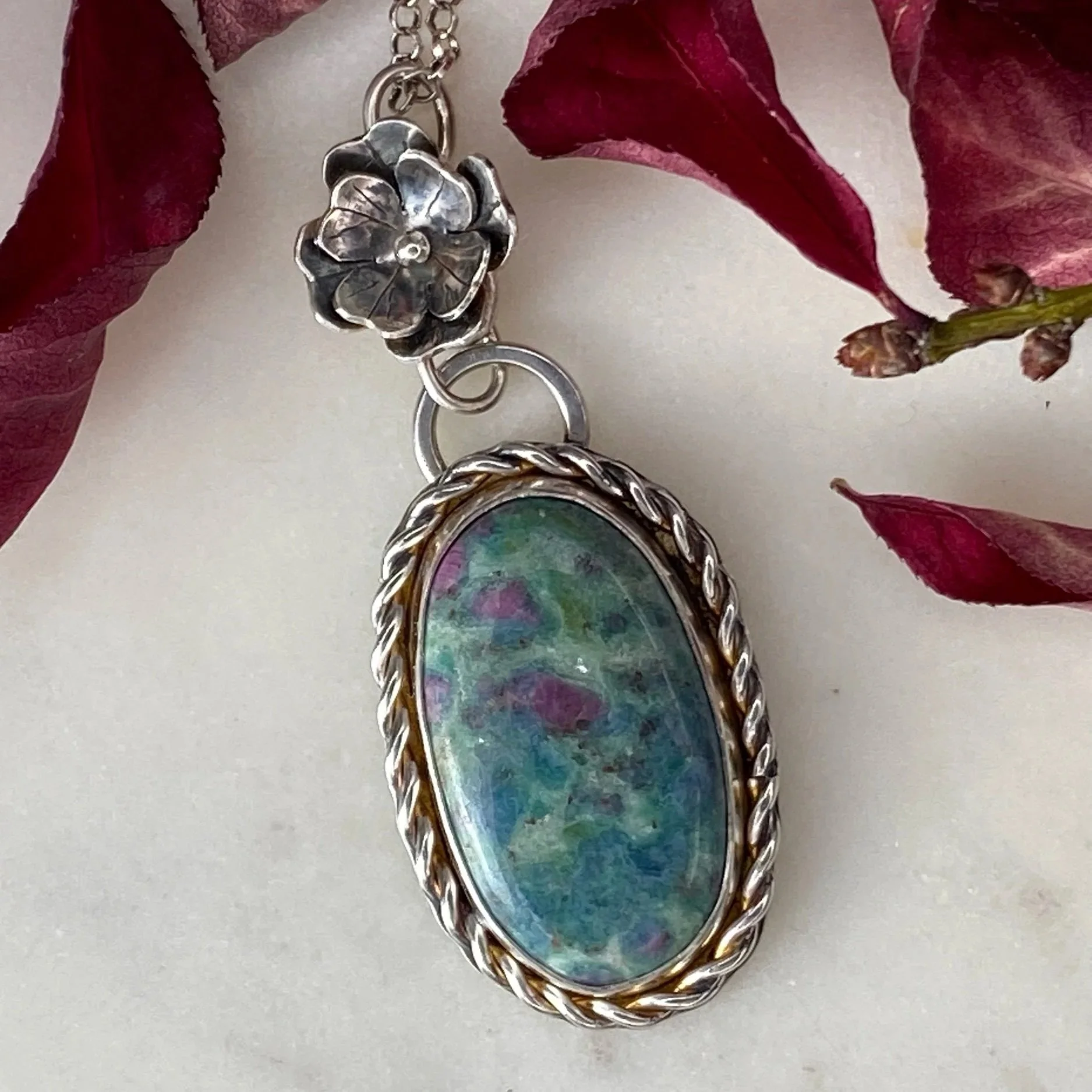 A beautiful Ruby Fuchsite stone set in a handcrafted sterling silver setting. The setting has been hallmarked in London. The piece has been designed and made by Rosie at Walter and Nancy Jewellery.