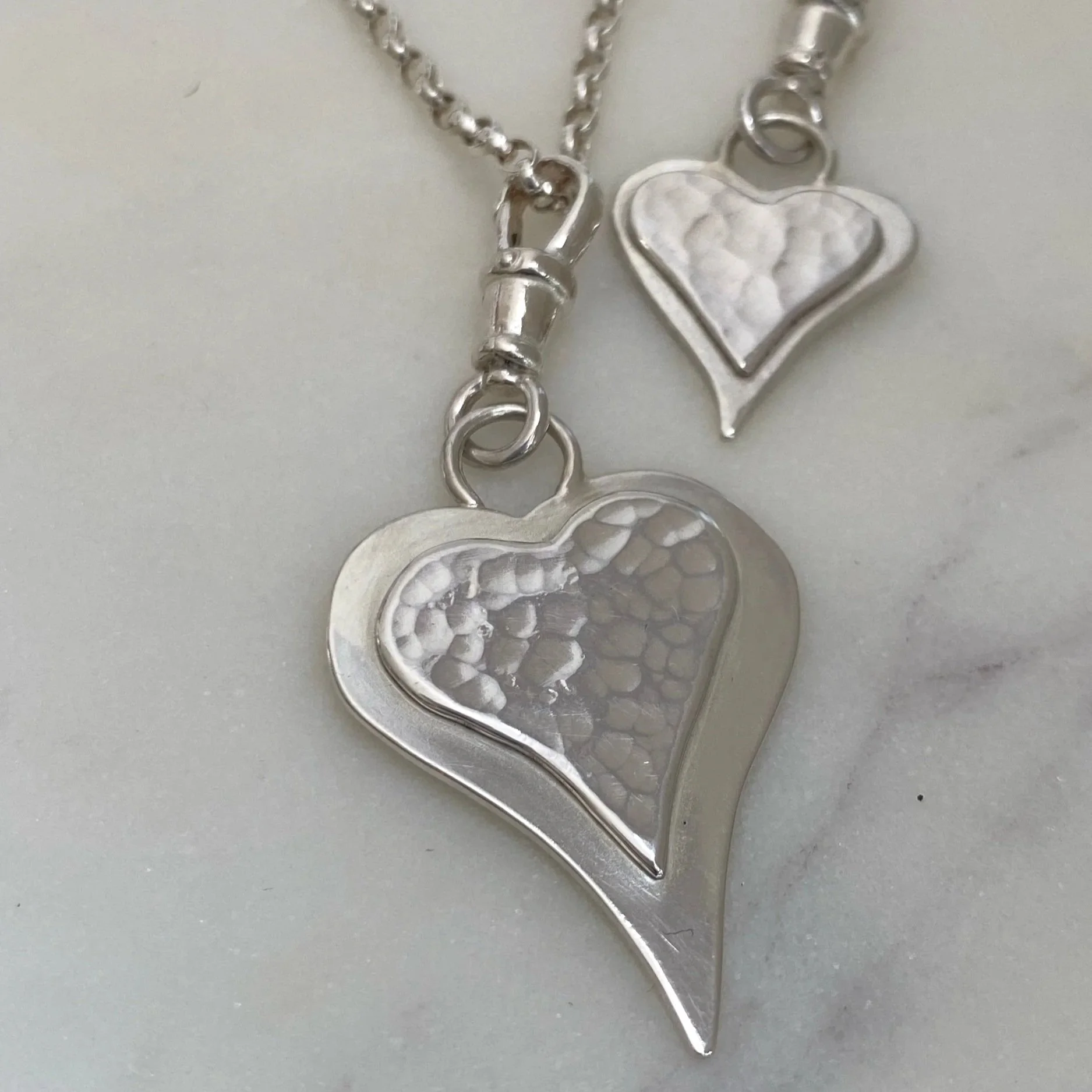 Walter and Nancy Jewellery Handmade Heart Charm - Large and Small to show size comparison.