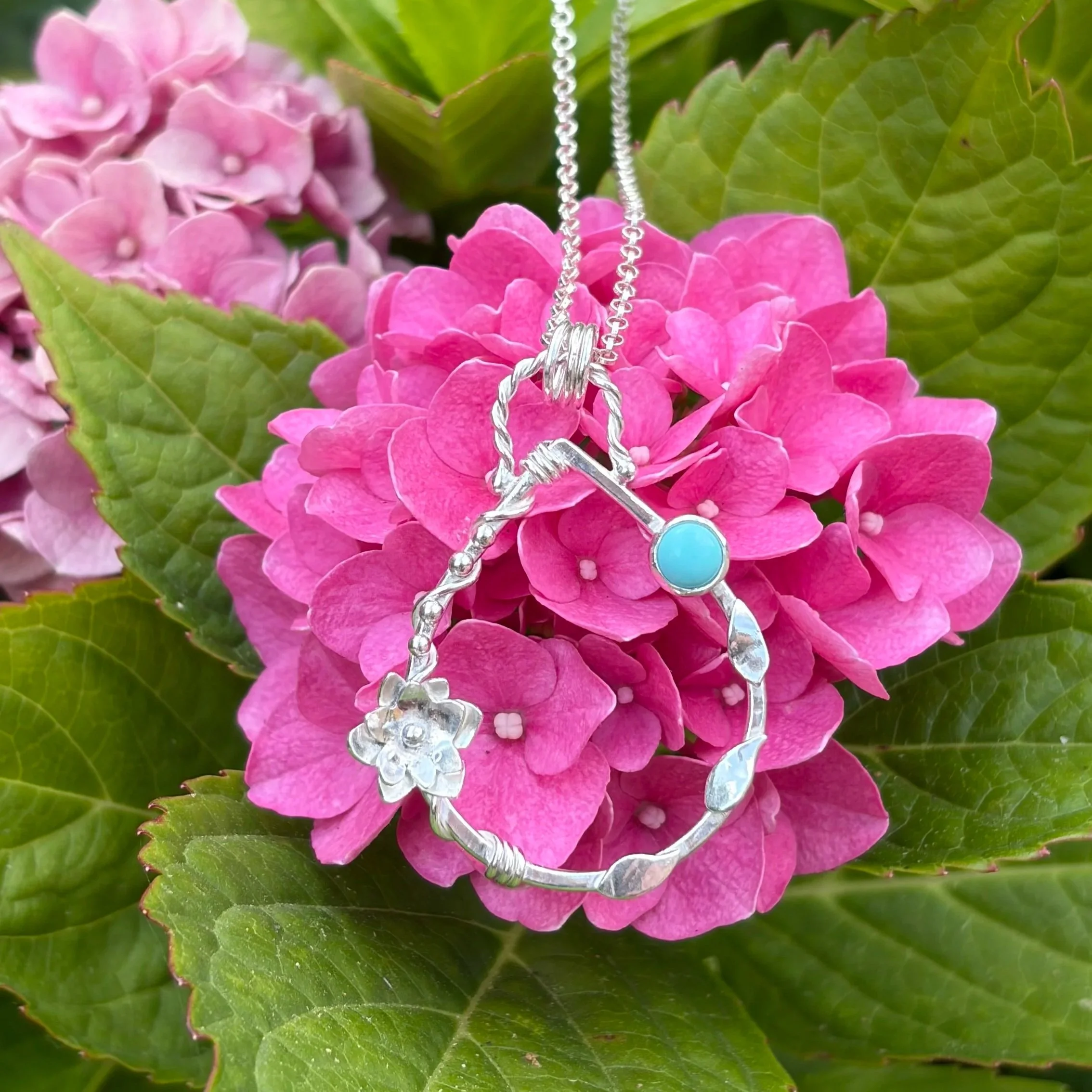 Handcrafted, botanical, sterling silver and turquoise pendant. Handmade by Walter and Nancy Jewellery.IMG_6247.jpg