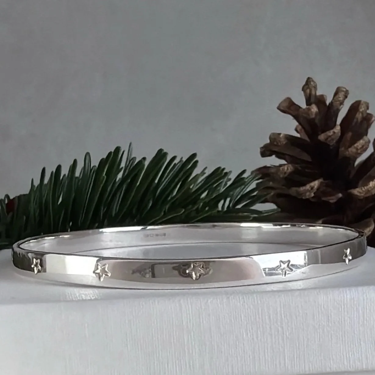 Handmade sterling silver luxury star bangle.