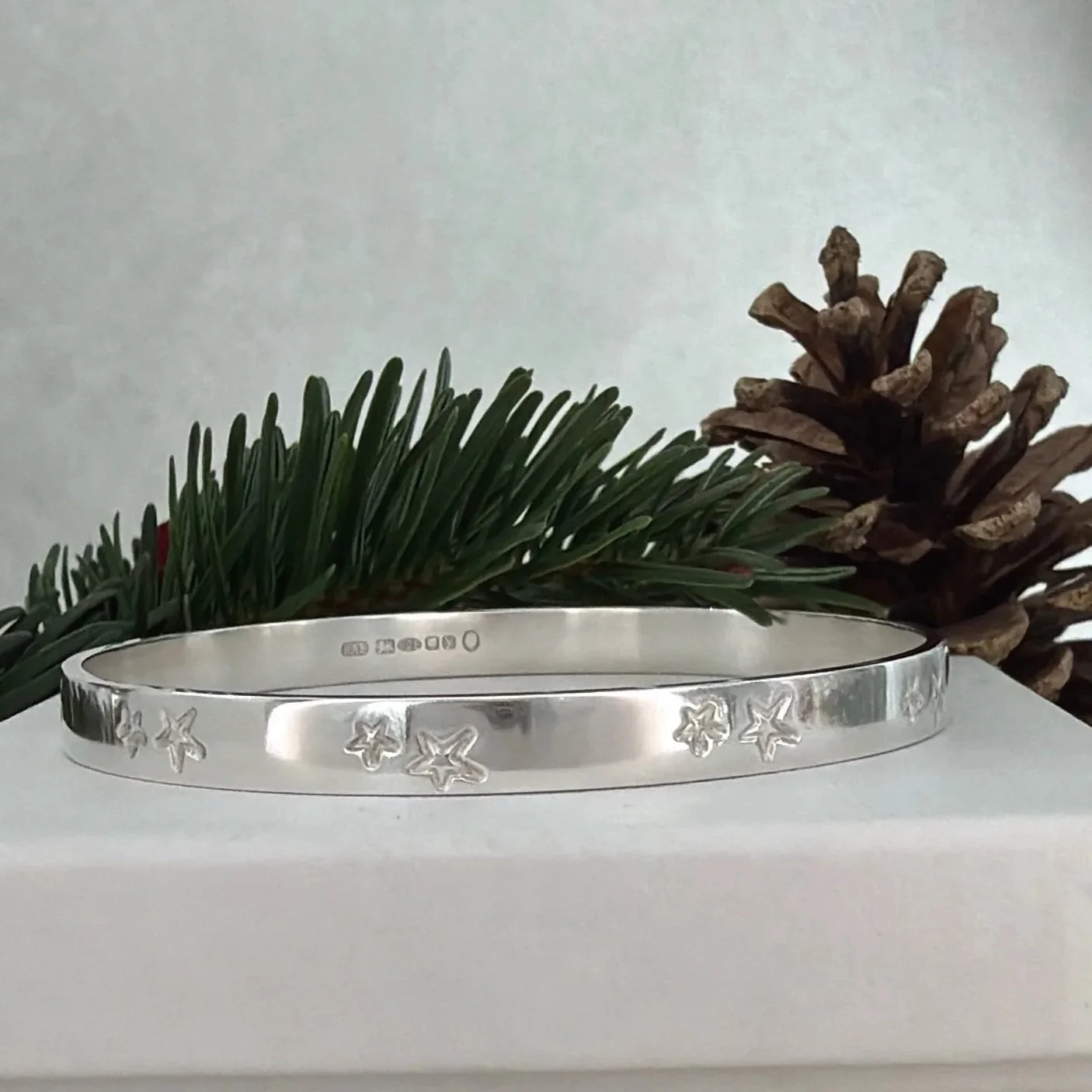 Handmade sterling silver star bangle.