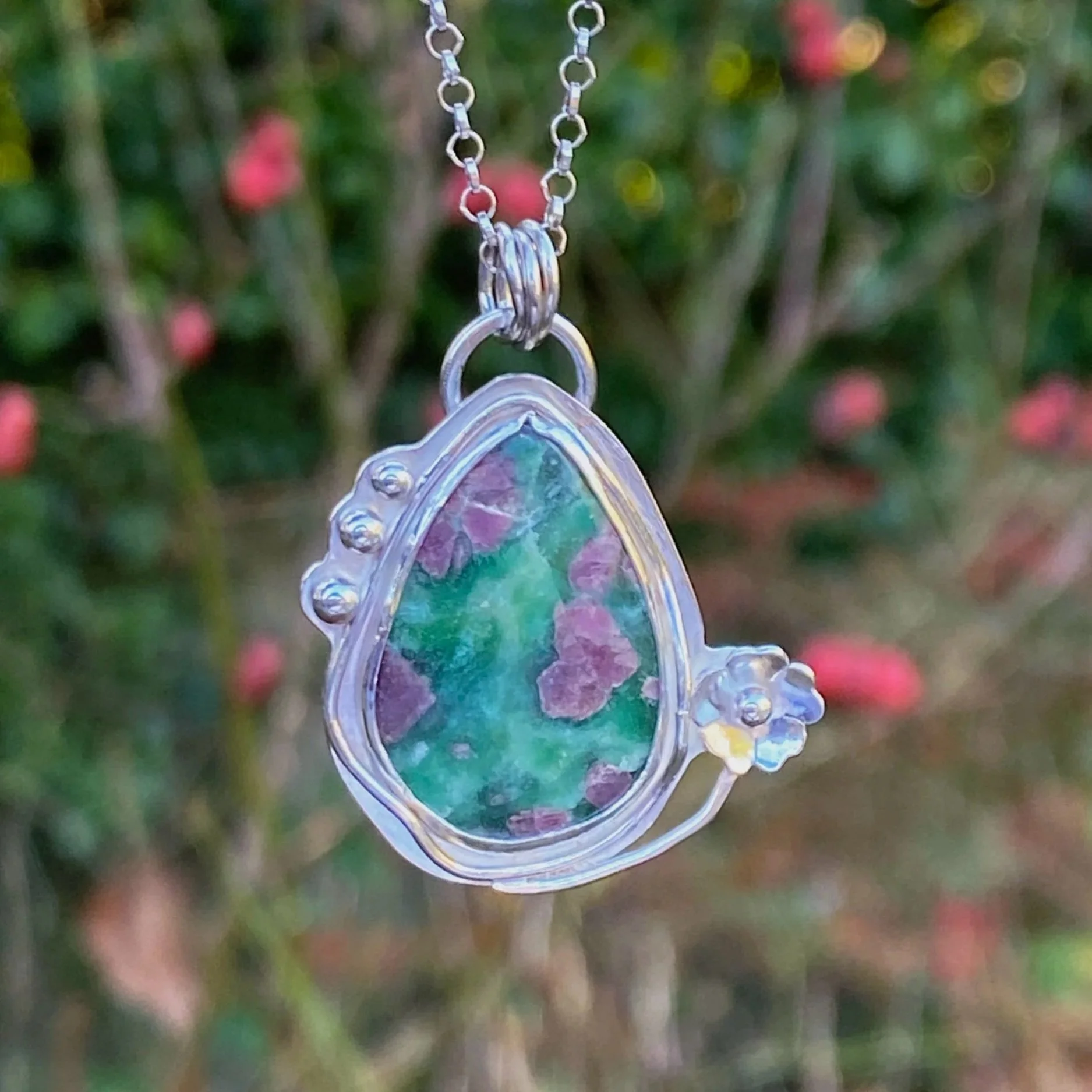 A beautiful Ruby Fuchsite stone set in a handcrafted sterling silver setting. The setting has been hallmarked in London. The piece has been designed and made by Rosie at Walter and Nancy Jewellery.