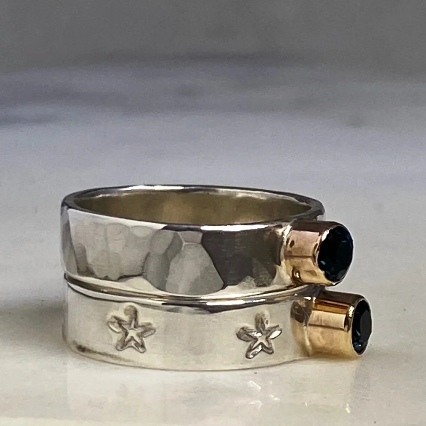 Handmade Sterling Silver, 9ct Gold and London Blue Topaz Ring. Hand crafted by Walter and Nancy Jewellery.