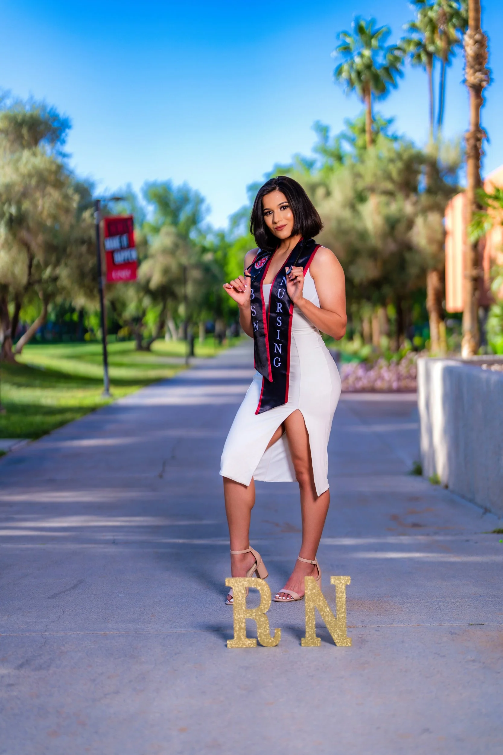 Nursing graduation portrait with sash and medal, Las Vegas