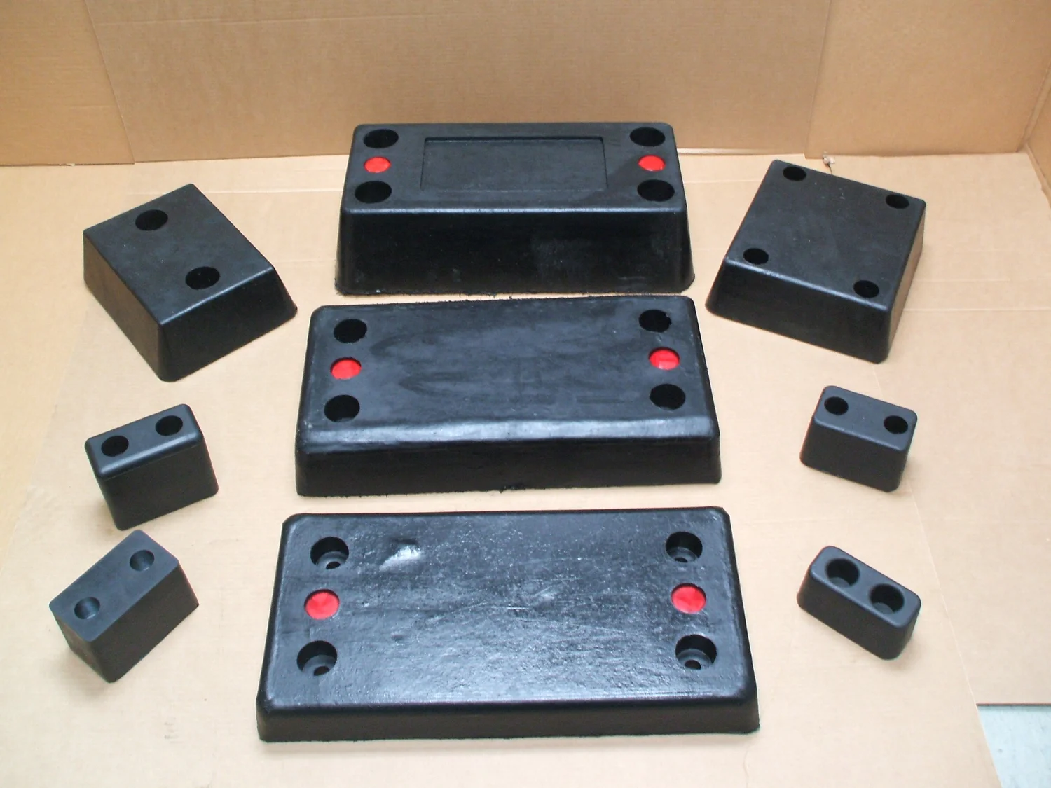 Bumpers & Pads — Hecht Rubber Corporation