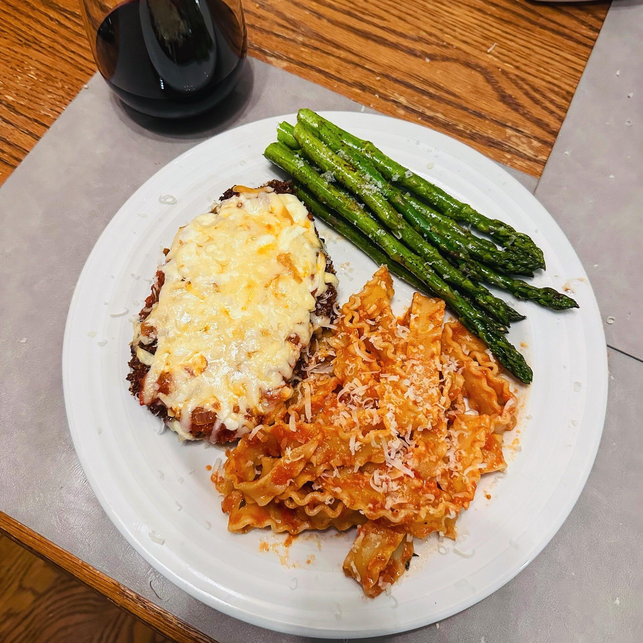 Chicken parmigiana with balsamic asparagus. Made with love.